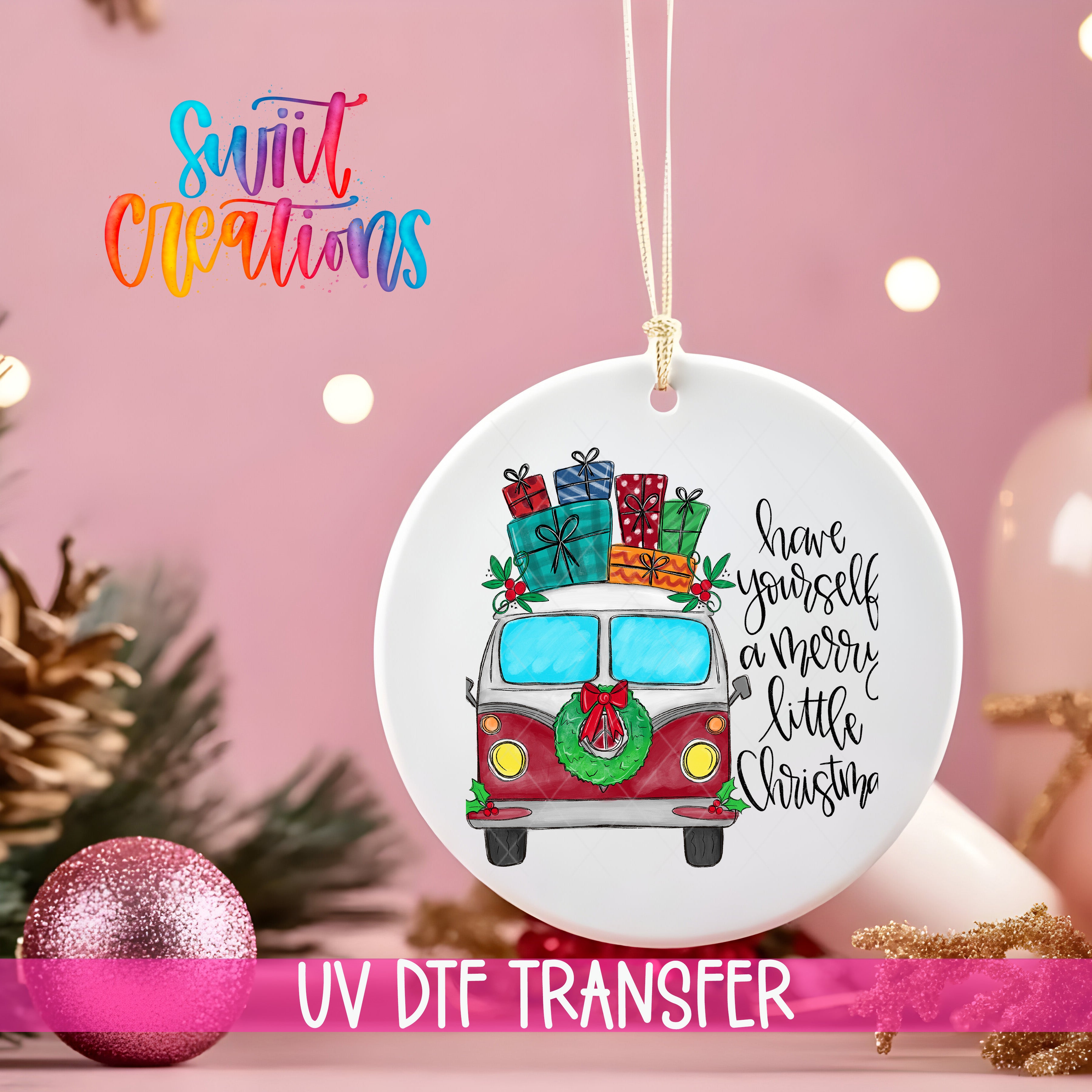 A white ornament with a red and white van design, decorated with Christmas presents and a wreath, hanging on a string. The ornament has a message that says "Have yourself a merry little Christmas".