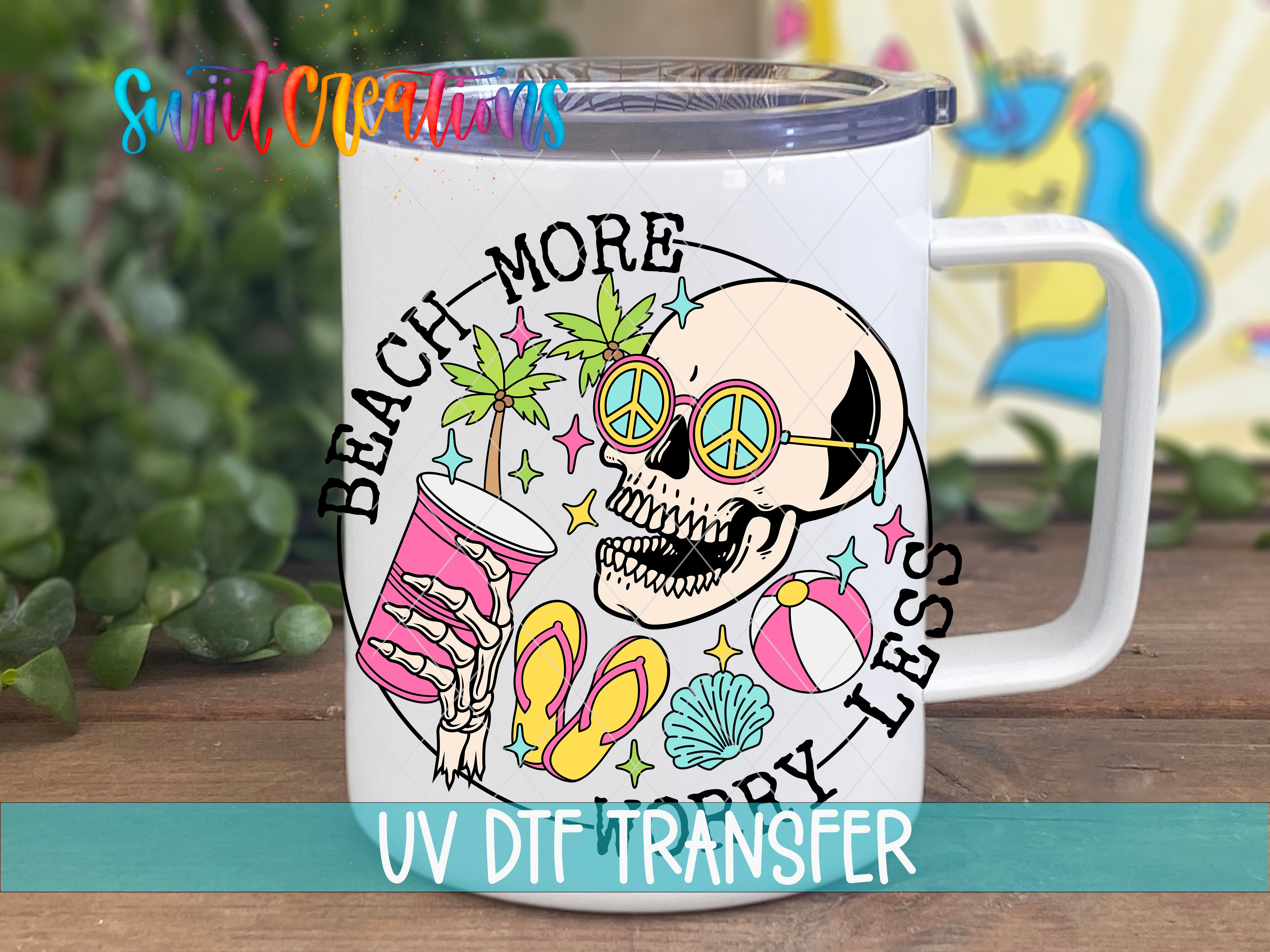 Swiit Creations UV DTF Beach More Worry Less transfer displayed on a white coffee mug