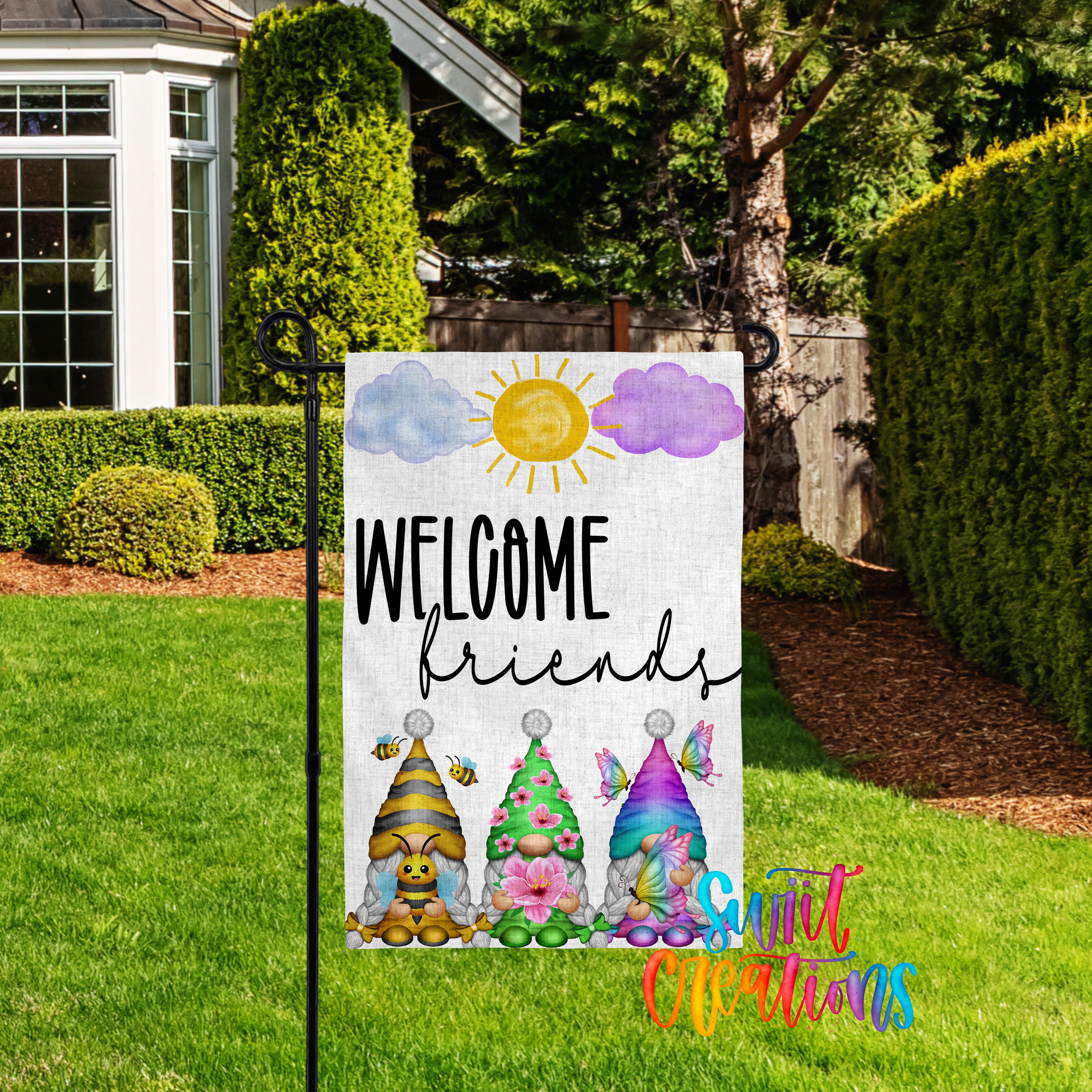 A colorful garden sign welcoming friends, featuring three gnomes with flowers and a sun in the background.
