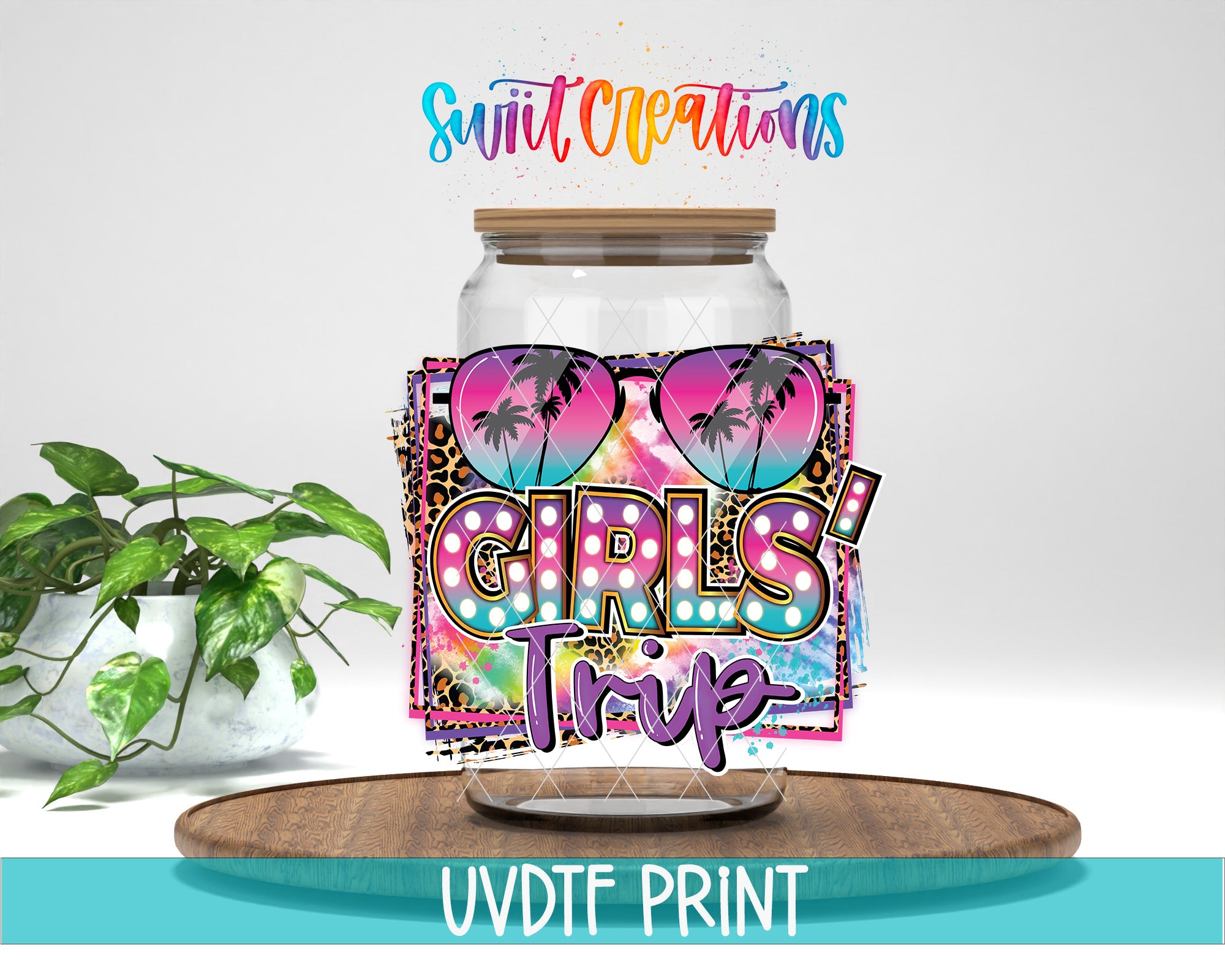 a large glass jar with a colorful, tropical-themed design, including sunglasses and palm trees, along with the text "Girls Trip!" The jar is placed on a wooden surface, and there is a potted plant in the background.