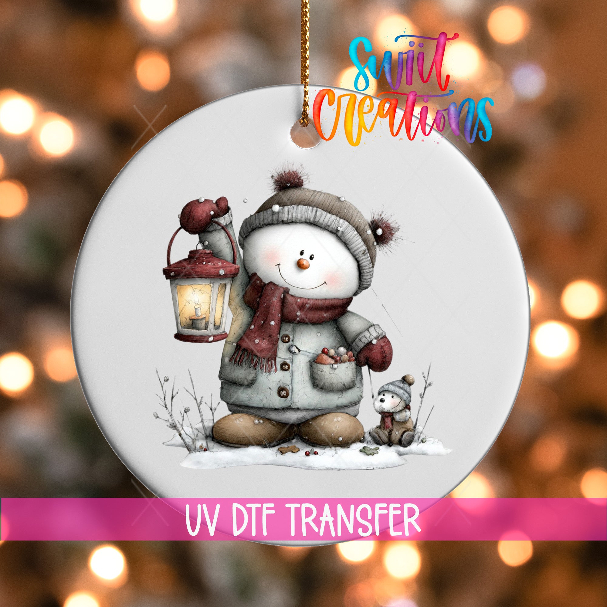 A snowman ornament with a lantern and a smaller snowman figure, set against a blurred background with Christmas lights.