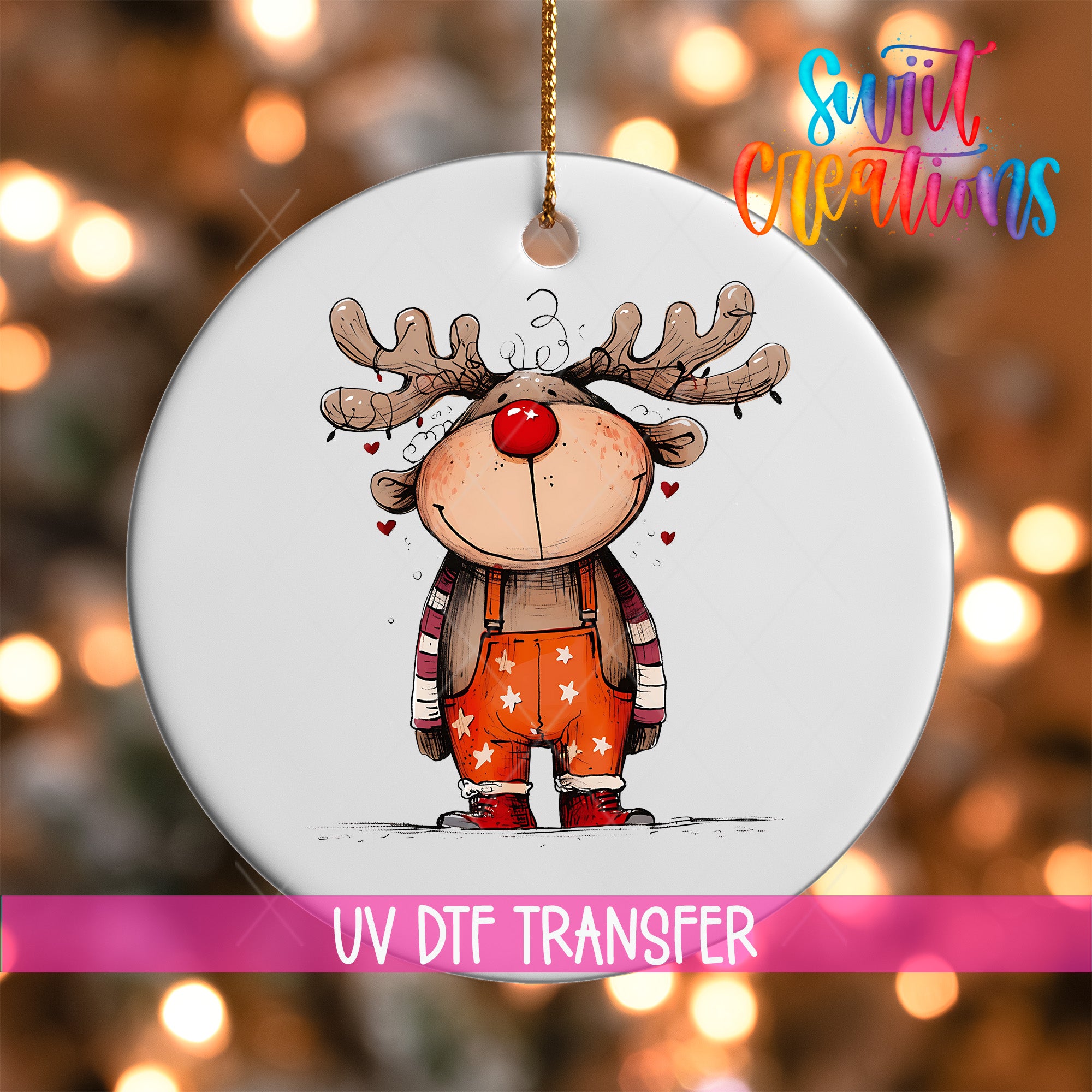 A white ornament featuring a cartoon reindeer with antlers and a red nose, set against a blurred background with colorful lights.