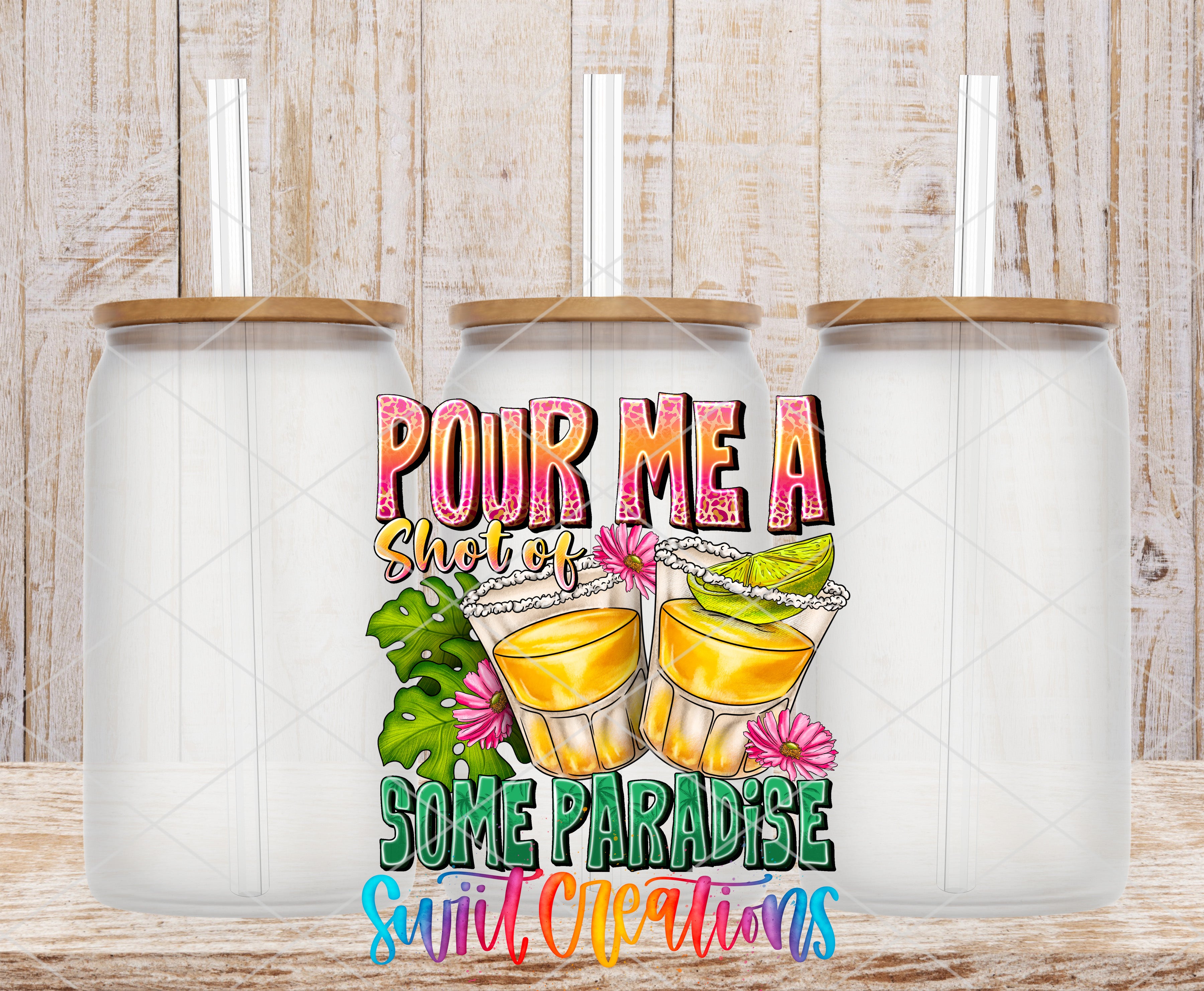 Swiit Creations UV DTF Pour Me a Shot of Some Sunshine transfer shown on a clear glass can set