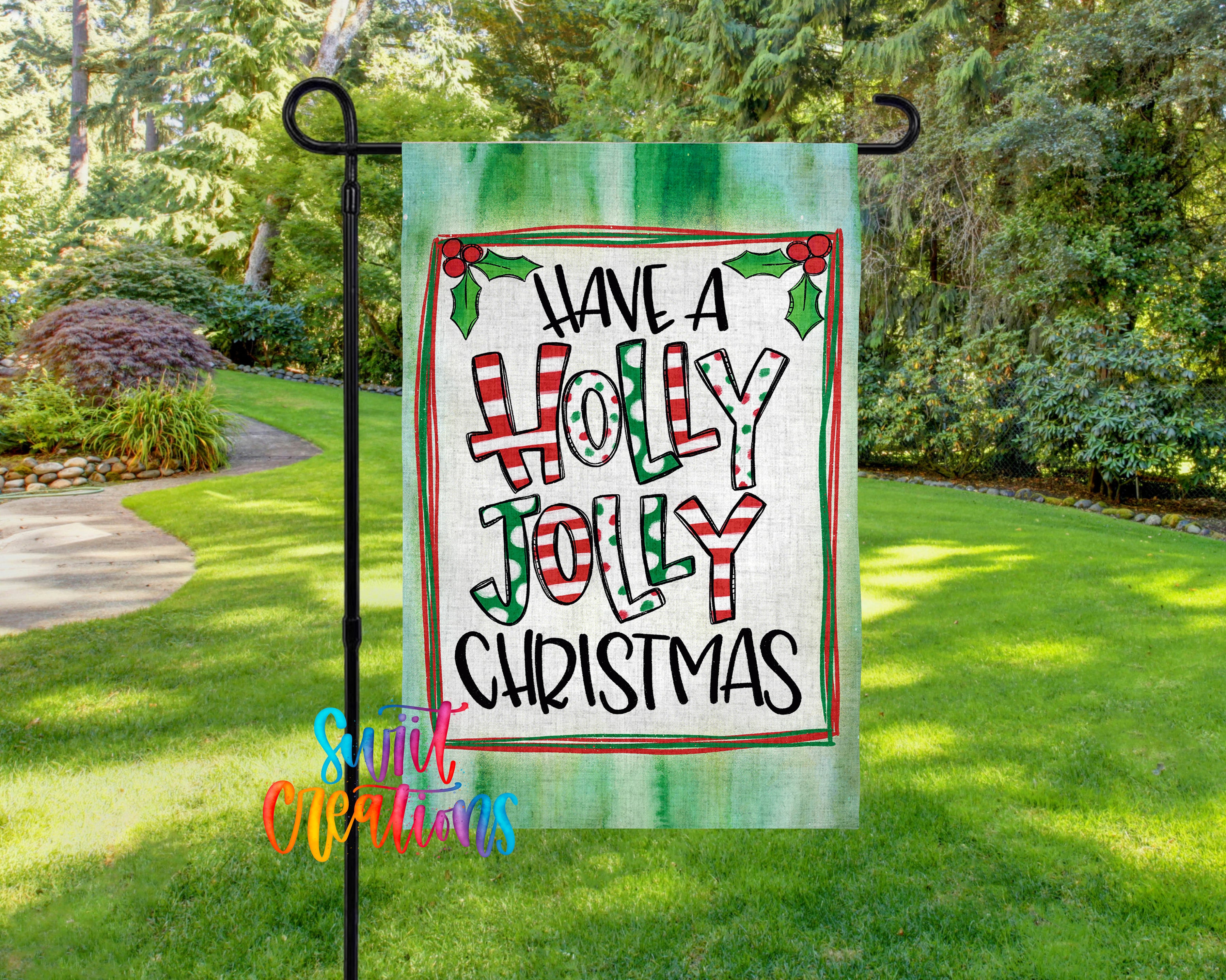 A garden flag with a festive holiday message, "Have a Holly Jolly Christmas", is displayed in a lush, green outdoor setting.