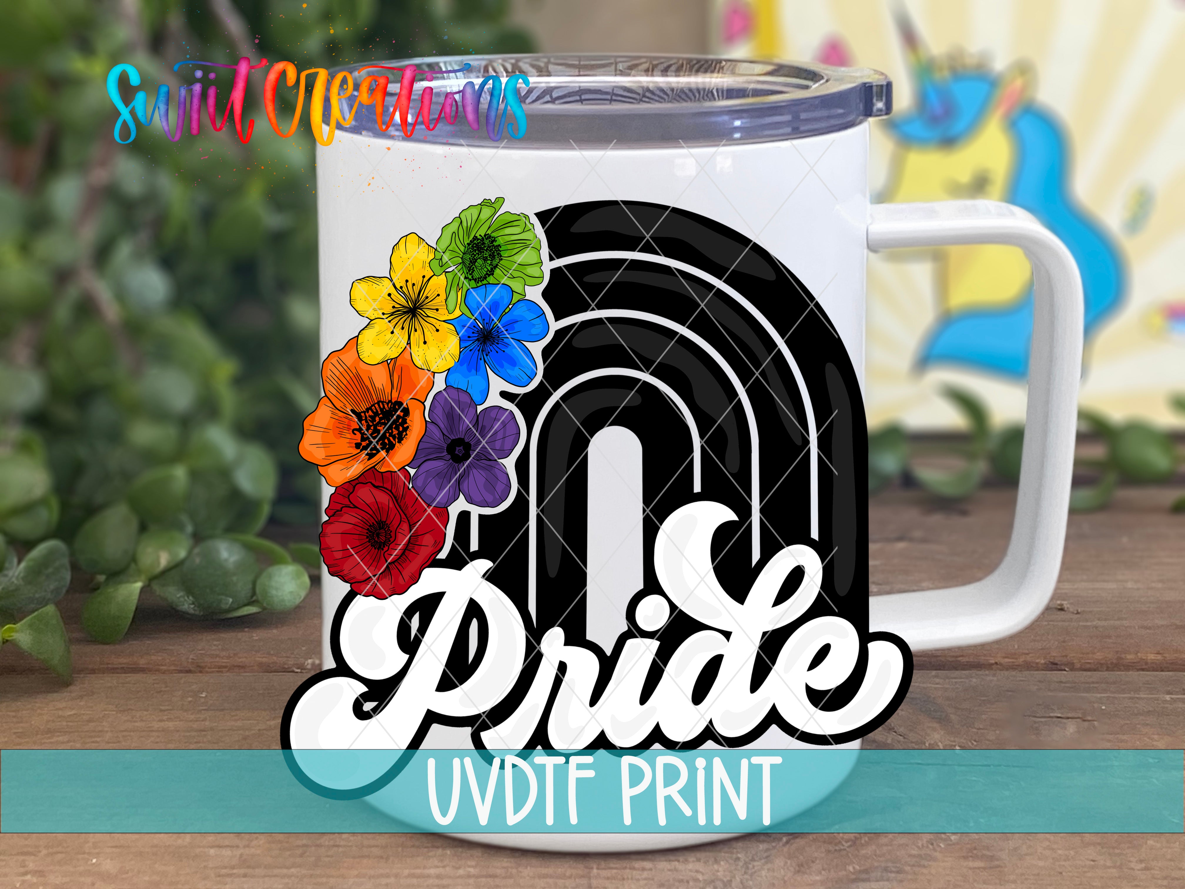 a white coffee mug with the word pride painted on it
