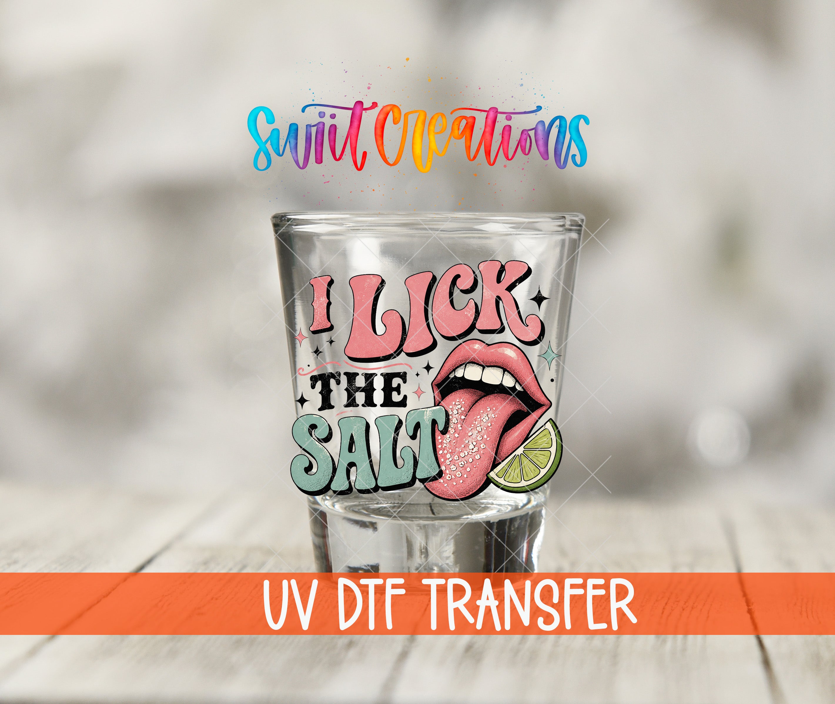 A glass with a colorful graphic design featuring a tongue sticking out and the text "I LICK THE SALT" on it.