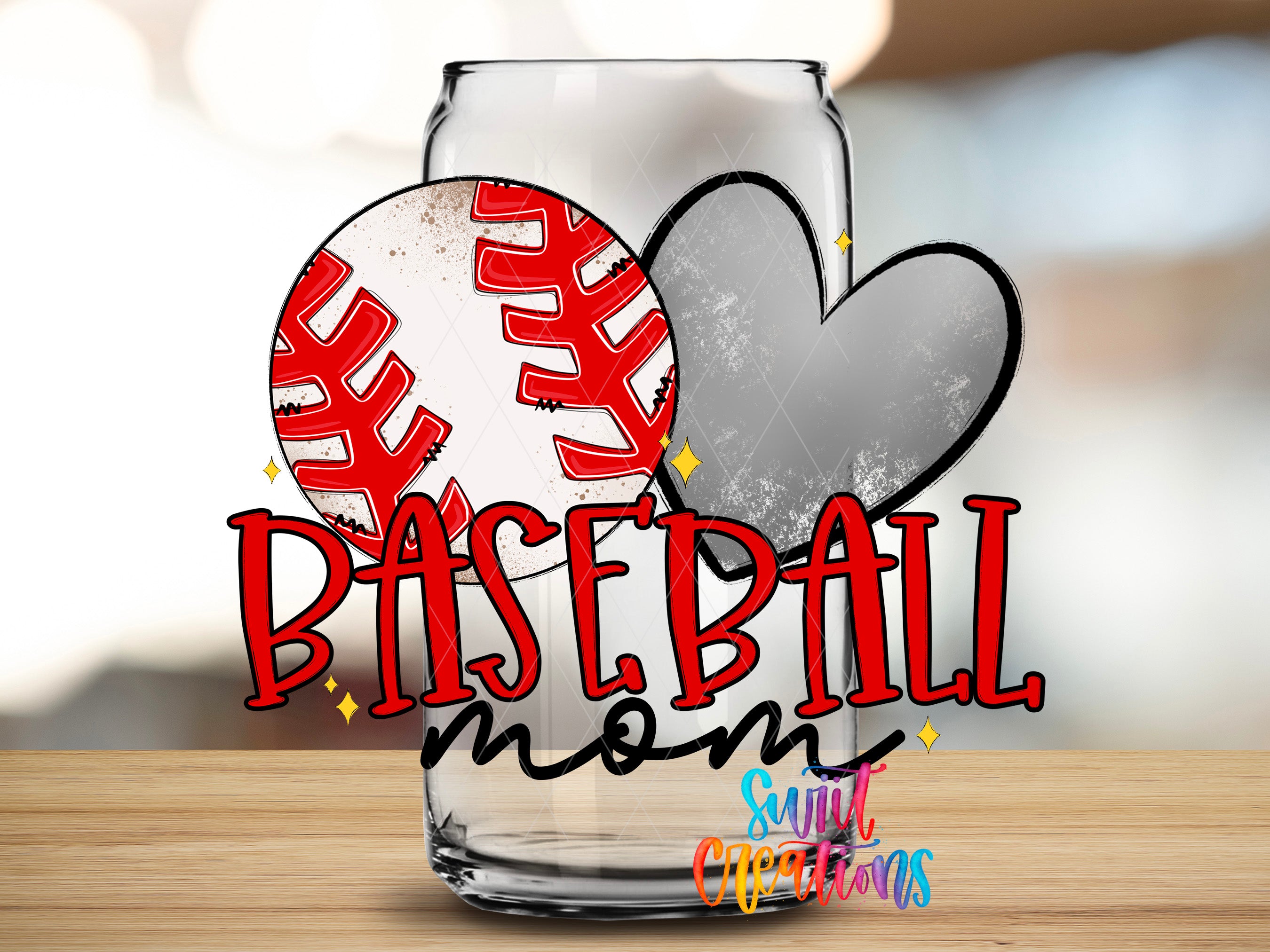 A glass can with a baseball and a heart cutout, along with the text "BASEBALL mom" and "Sign of Christ" written on it.