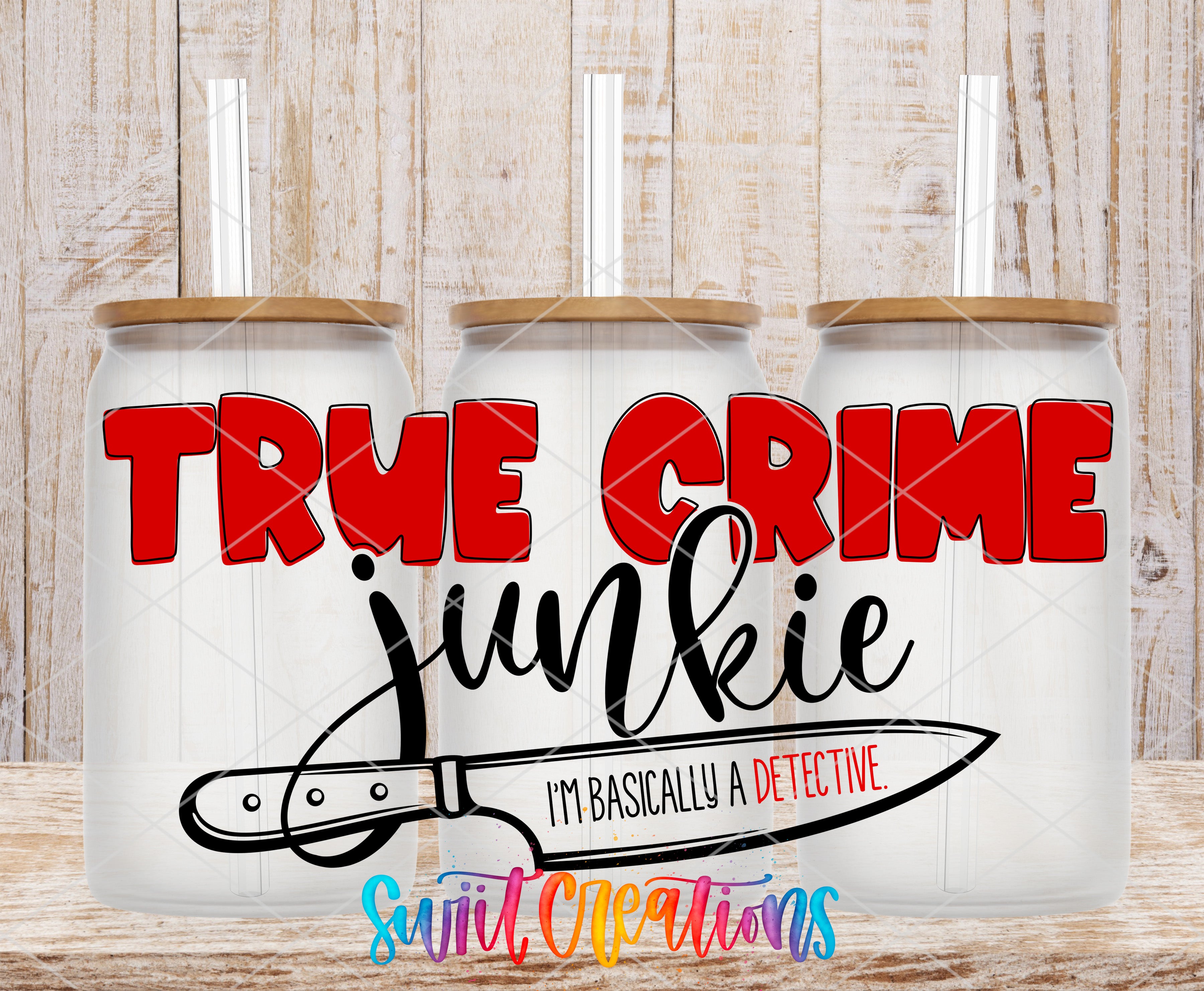 Swiit Creations UV DTF True Crime Junkie transfer shown on a clear glass can set
