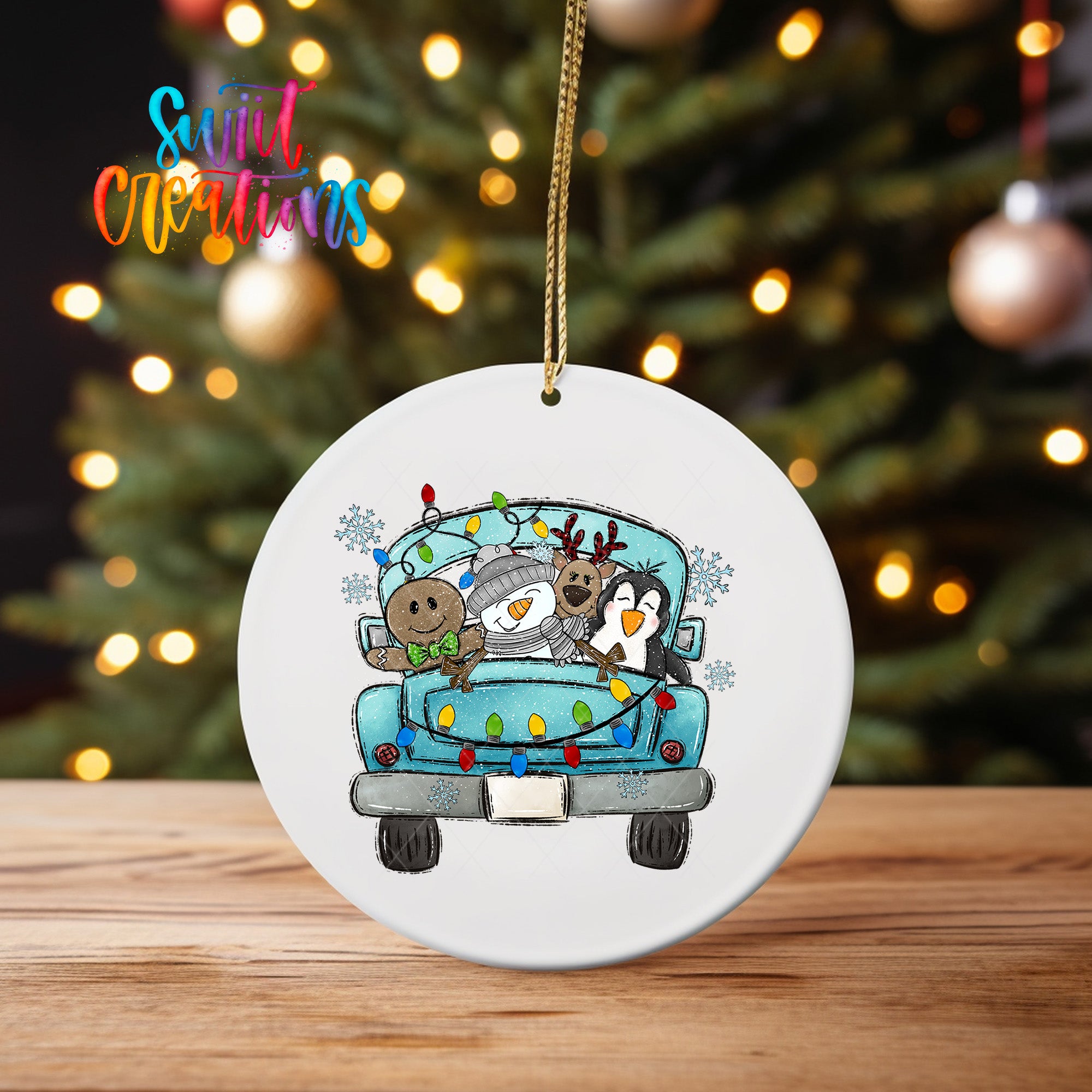A white ceramic ornament featuring a cartoon illustration of a truck with a snowman, reindeer, and penguins riding in the back.