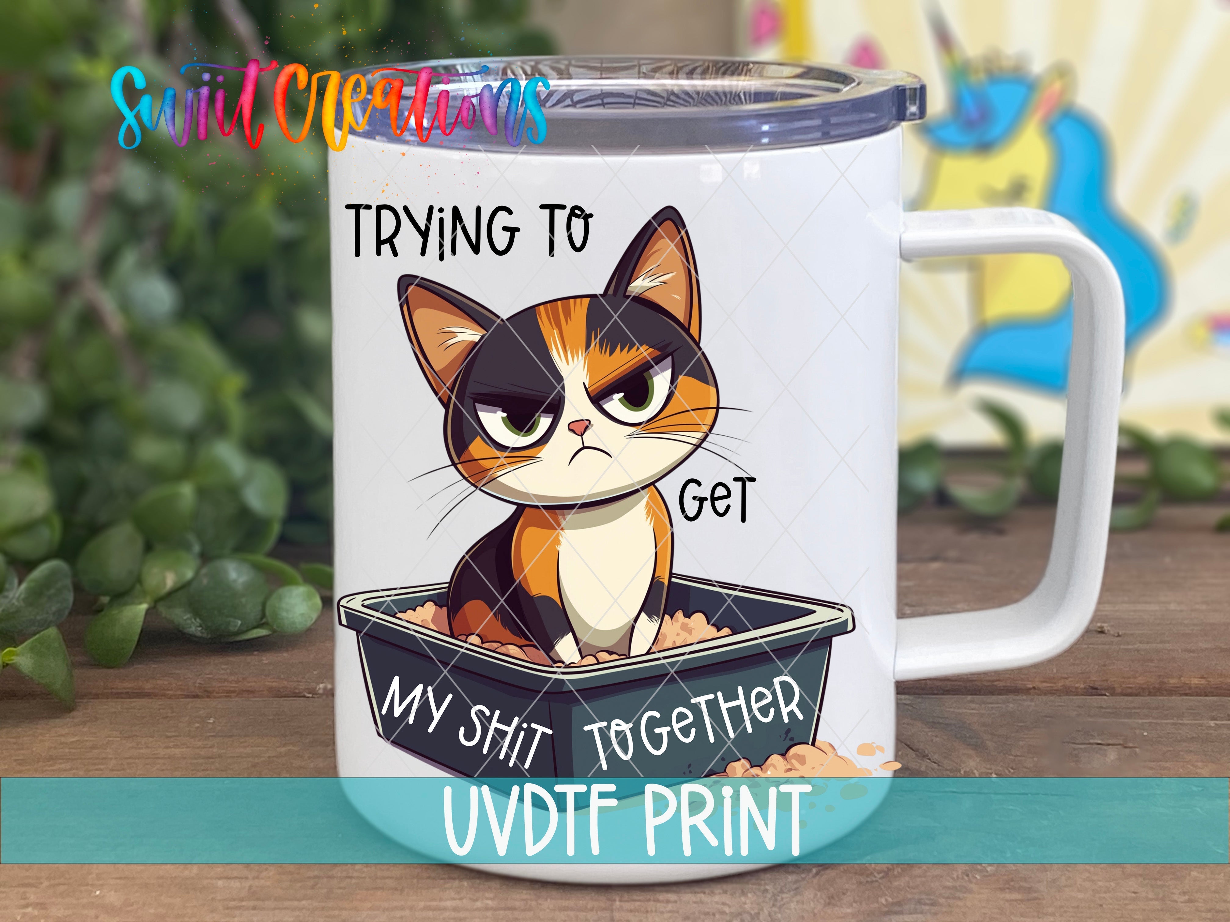 a coffee mug with a cartoon cat on it