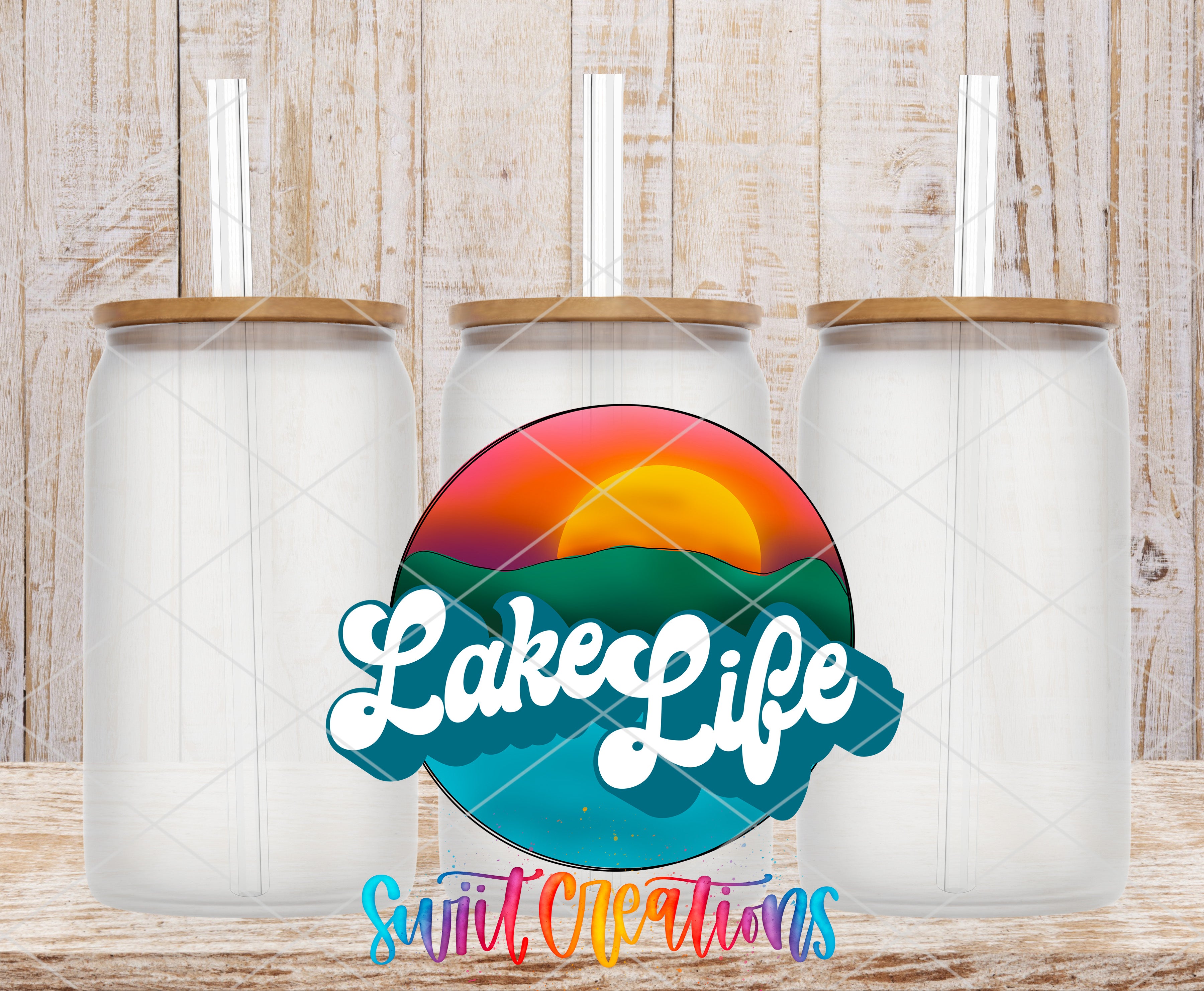 Swiit Creations UV DTF Lake Life retro sunset transfer on a clear glass can set
