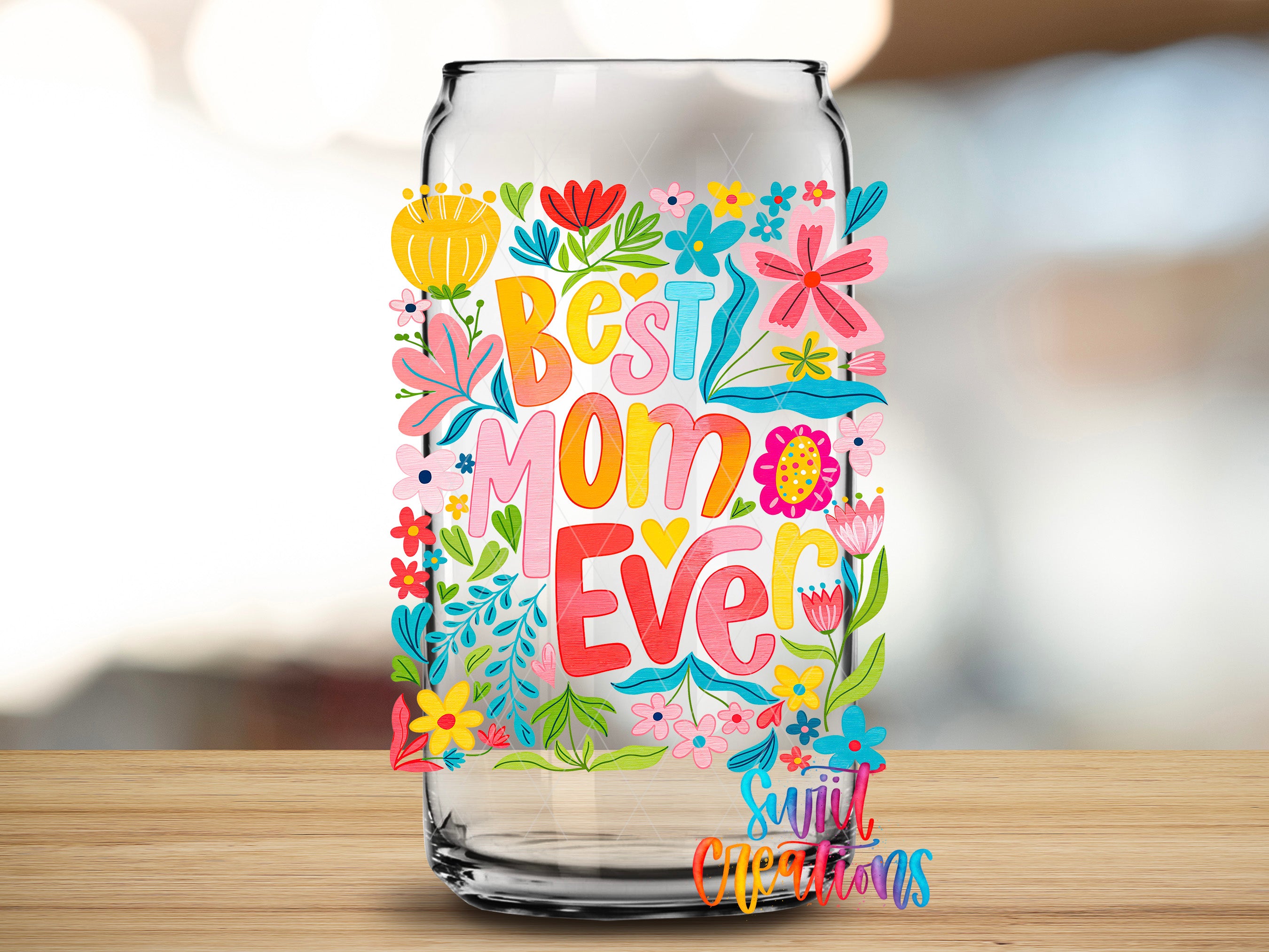 A glass jar with a colorful floral design and the text "Best Mom Ever" printed on it.