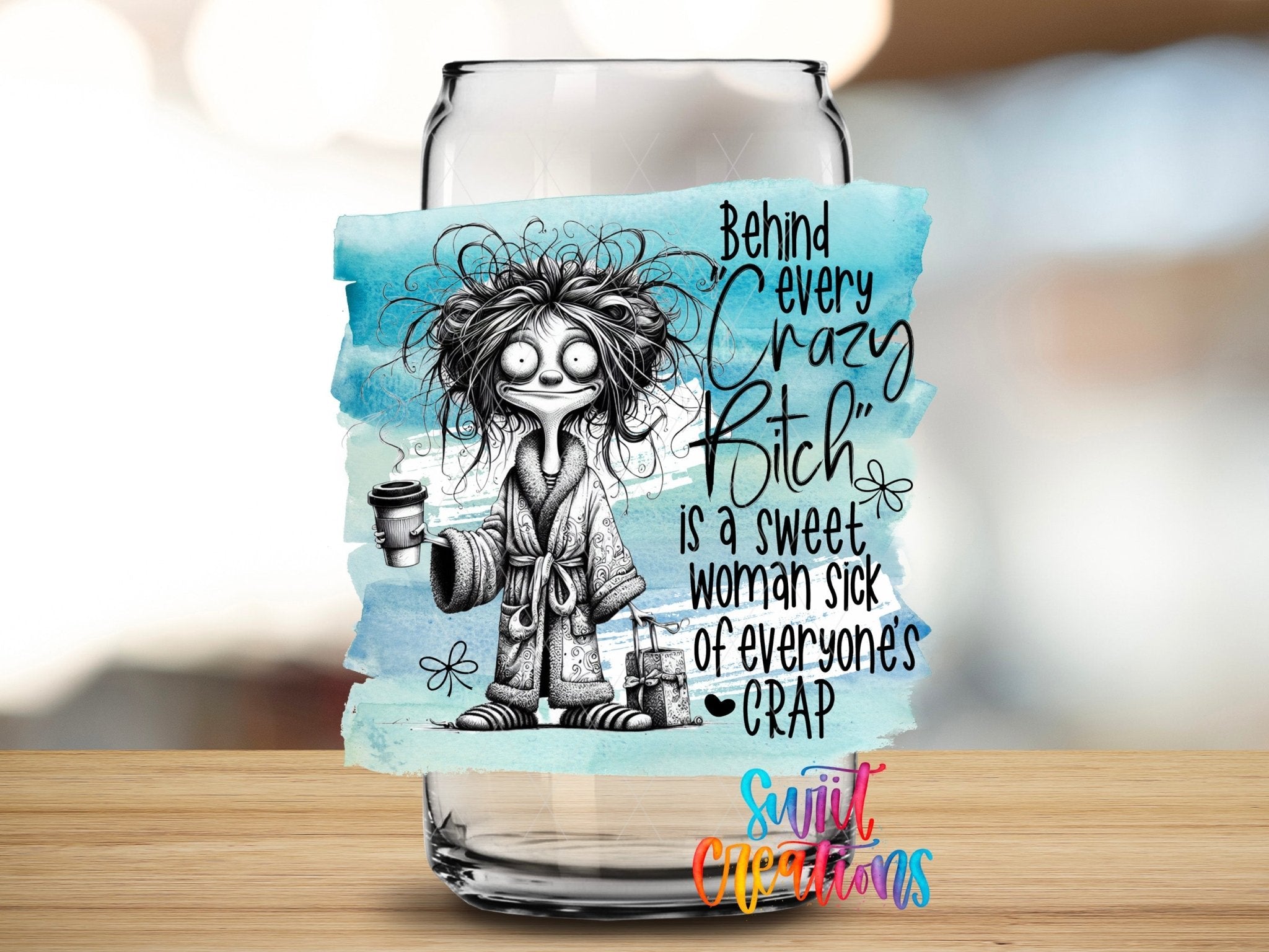 Swiit Creations UV DTF Behind Every Crazy Bitch transfer applied to a clear glass can