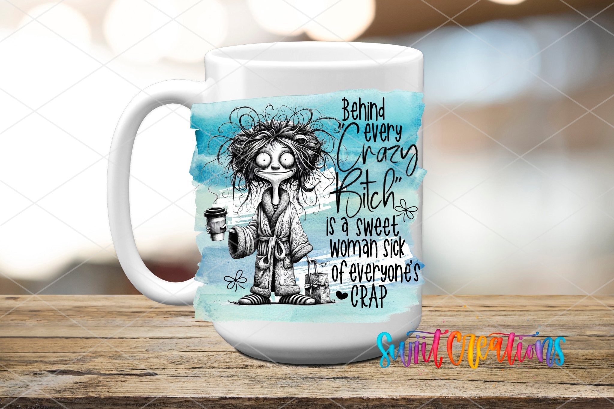 Swiit Creations UV DTF Behind Every Crazy Bitch transfer applied to a white ceramic mug