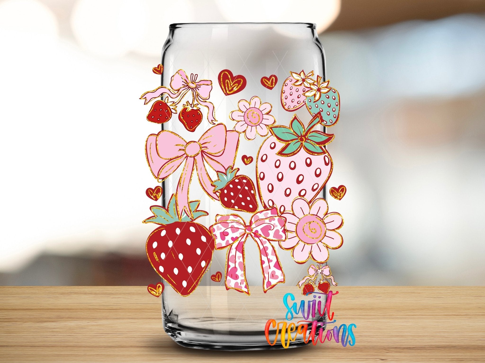 Boho Strawberry Coquette UV DTF transfer applied to a clear glass can from Swiit Creations