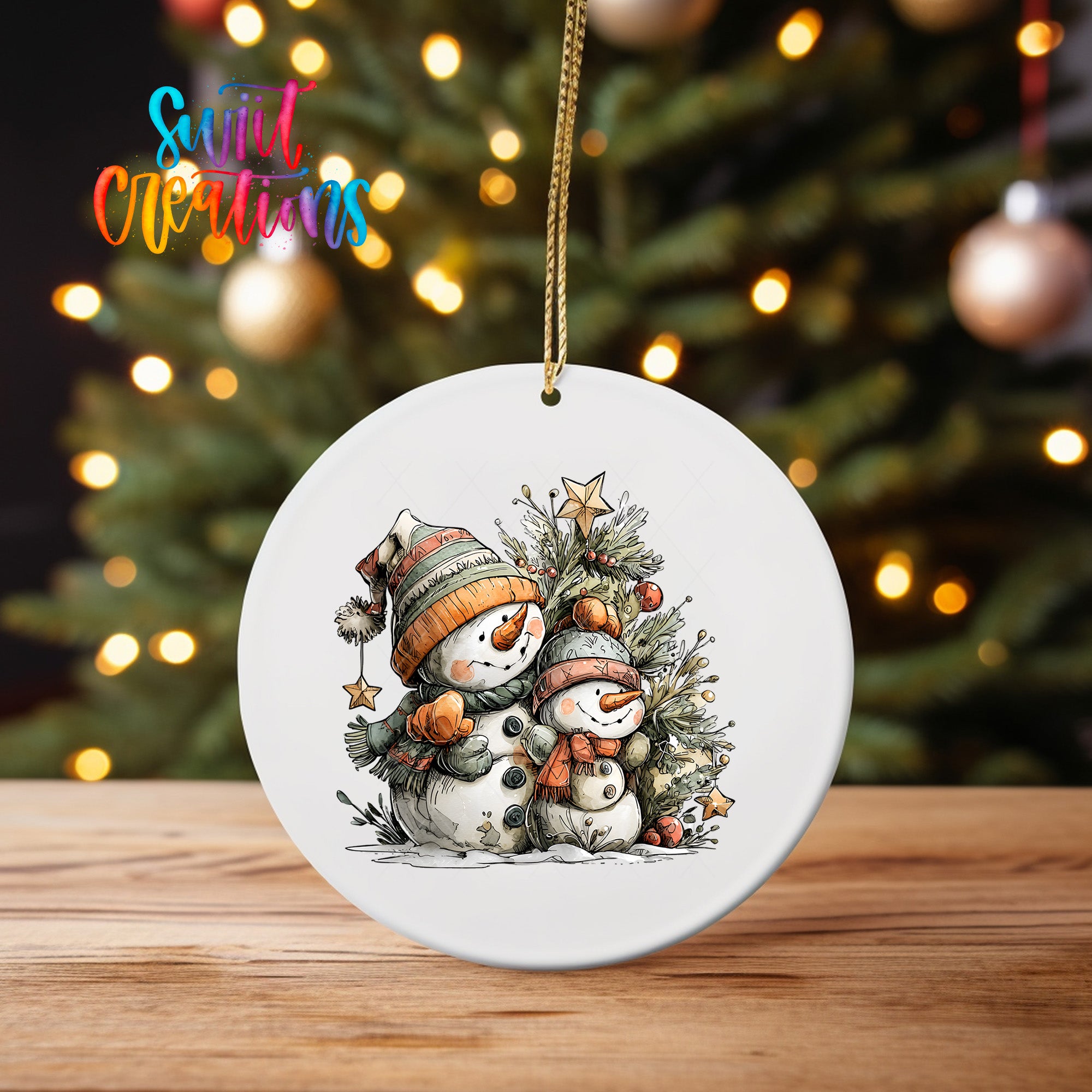 A white ceramic ornament featuring a snowman and a star, hanging on a string against a blurred background of Christmas lights.