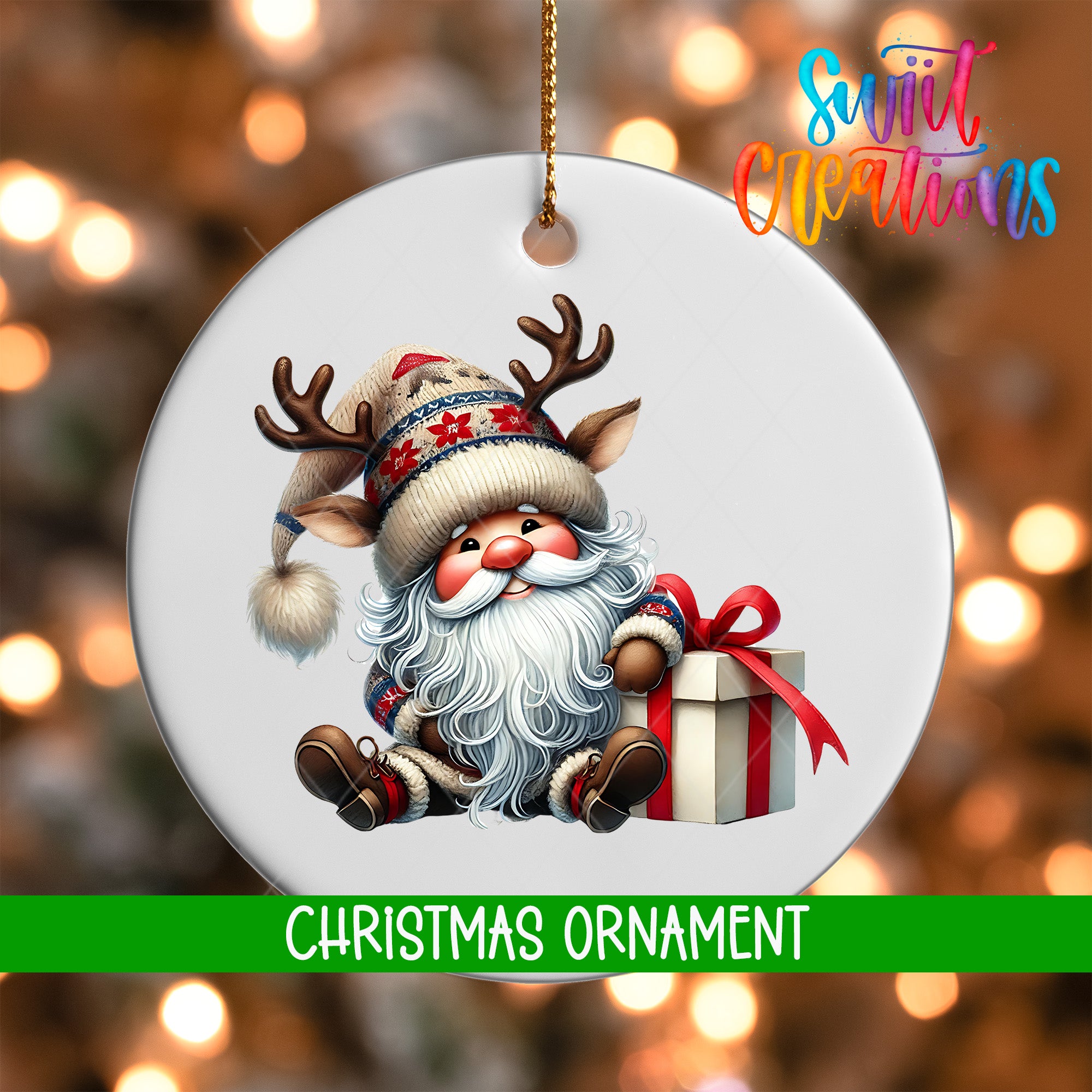 A Christmas ornament featuring a smiling Santa Claus holding a gift box, with a blurred background of Christmas lights.