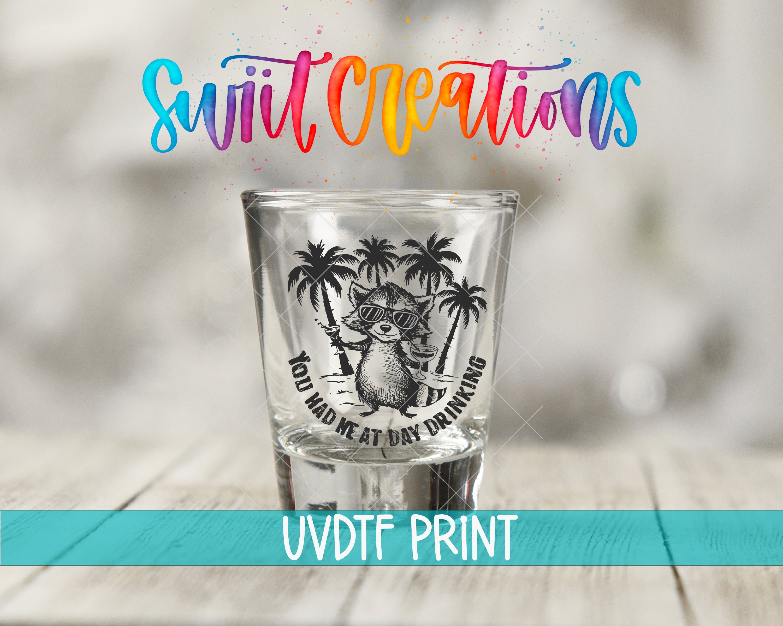 A shot glass with a graphic design featuring a cat wearing sunglasses and holding a drink, along with the text "You Had Me at Dry Drinking" and "Swift Creations" written above it.