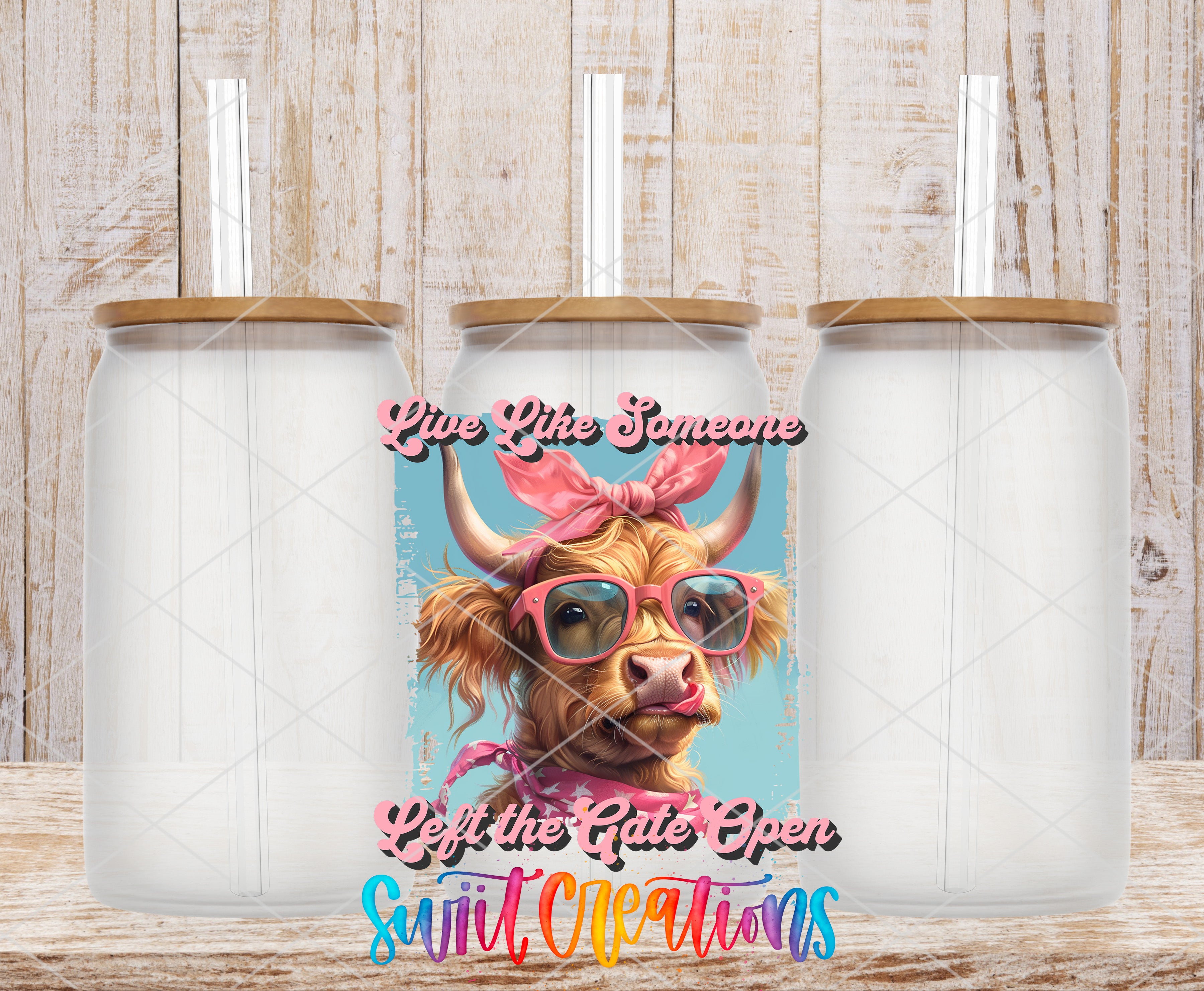 Swiit Creations UV DTF Live Like Someone Left the Gate Open transfer shown on a clear glass can set