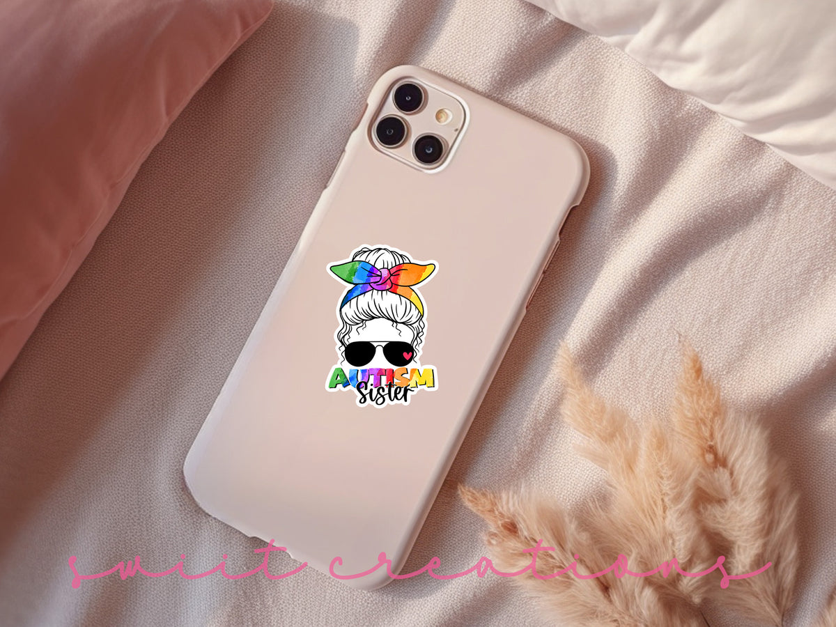 Autism Sister sticker on a pink phone case