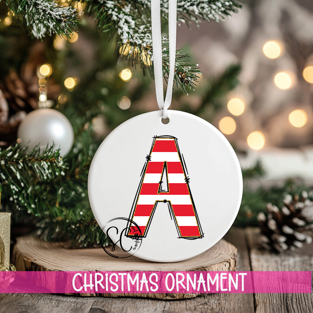 a christmas ornament hanging from a christmas tree