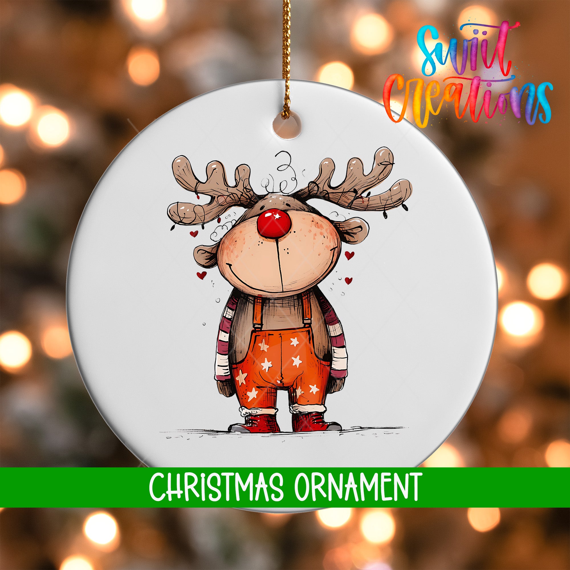 A white Christmas ornament featuring a cartoon reindeer with antlers and a red nose, wearing orange overalls with white stars.