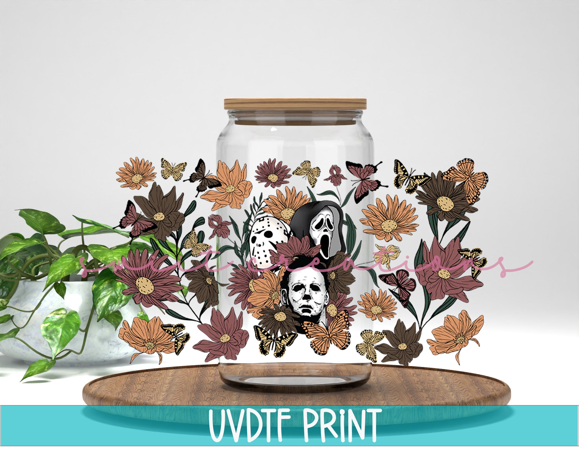 a vase with flowers and a skull on it