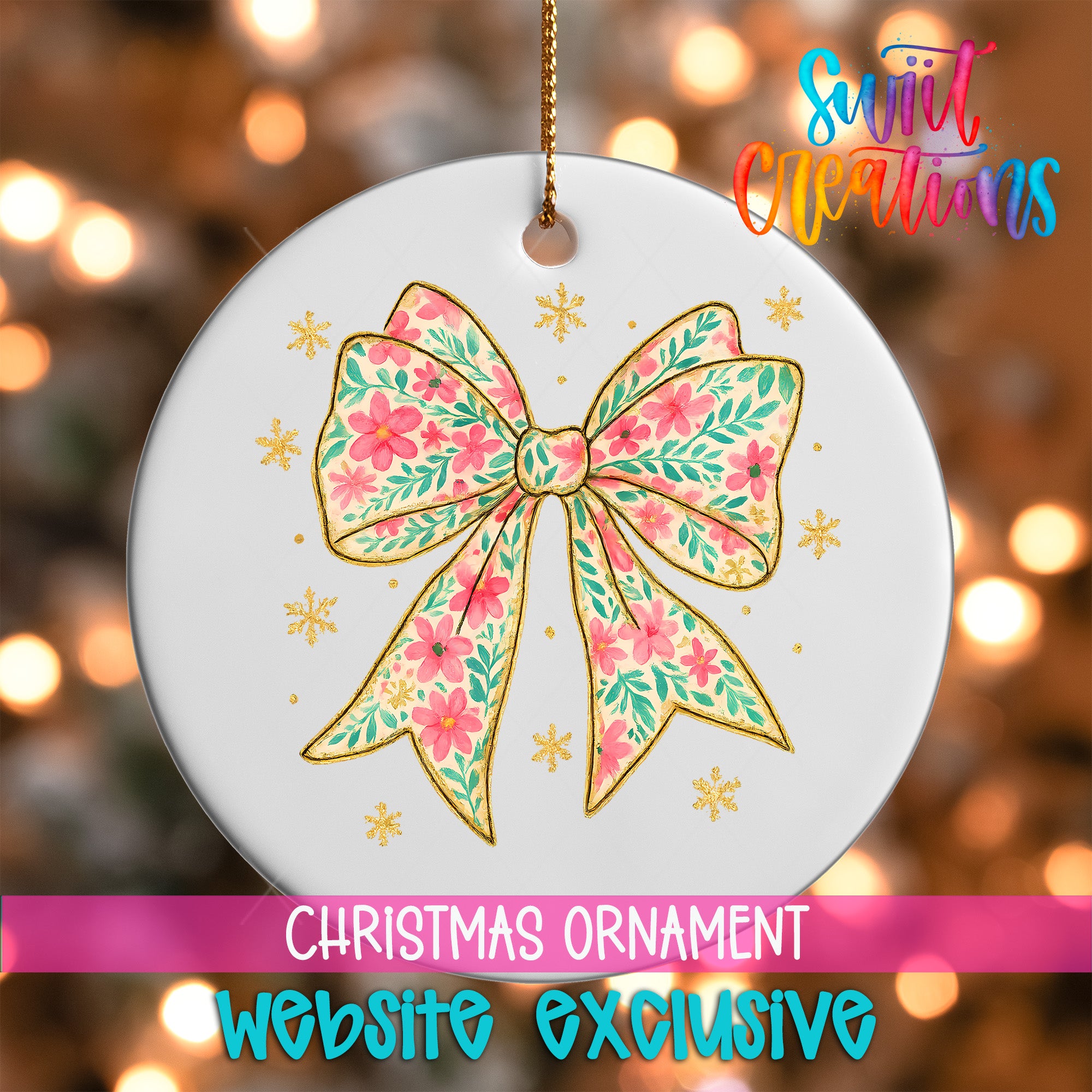 A white Christmas ornament with a floral bow and snowflakes, hanging against a background of colorful lights.