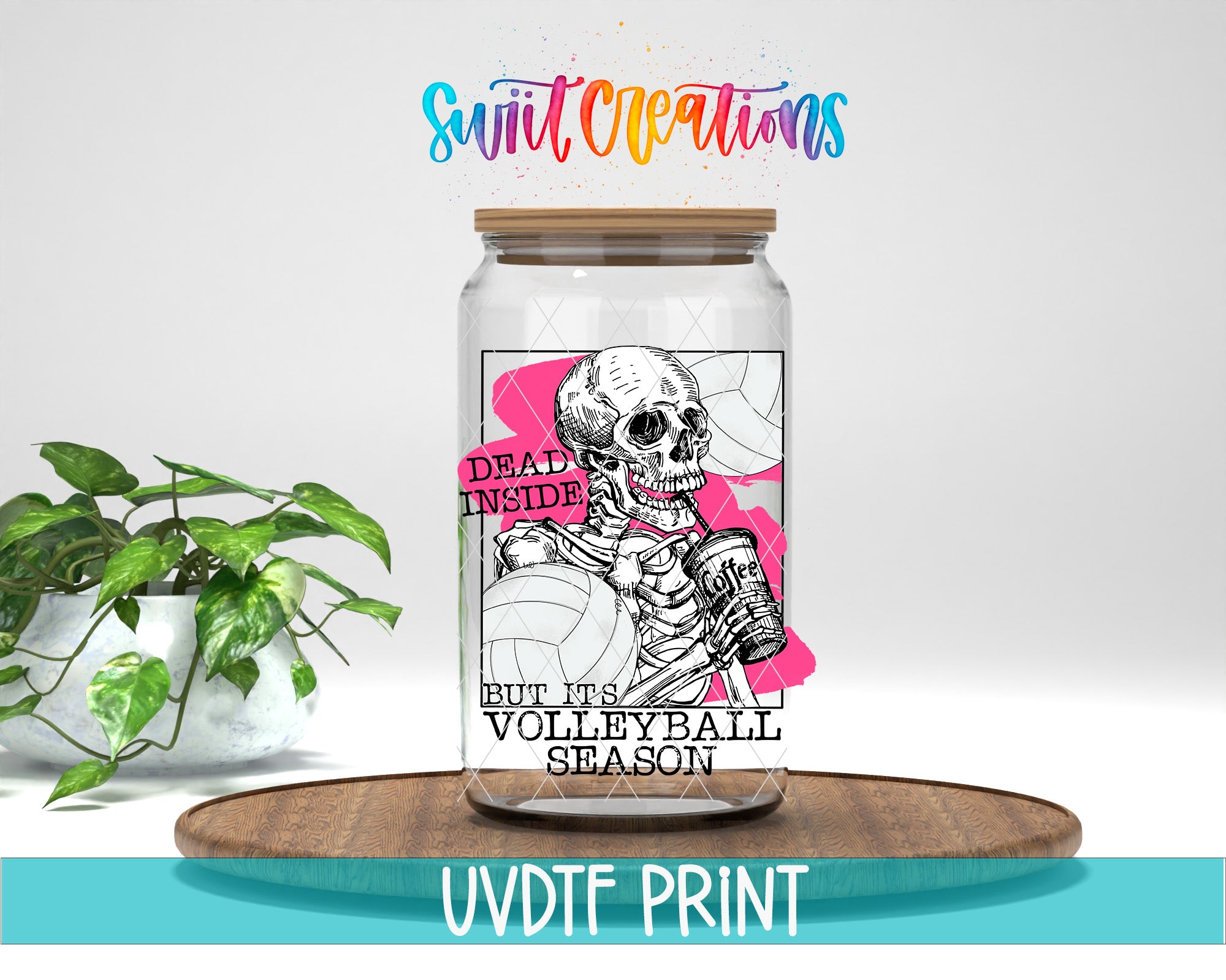 a jar with a skeleton on it sitting next to a potted plant