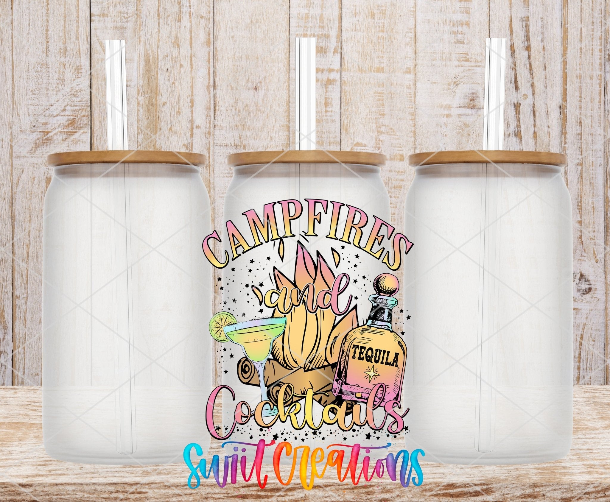 Campfires and Cocktails UV DTF transfer applied to a clear glass can set from Swiit Creations