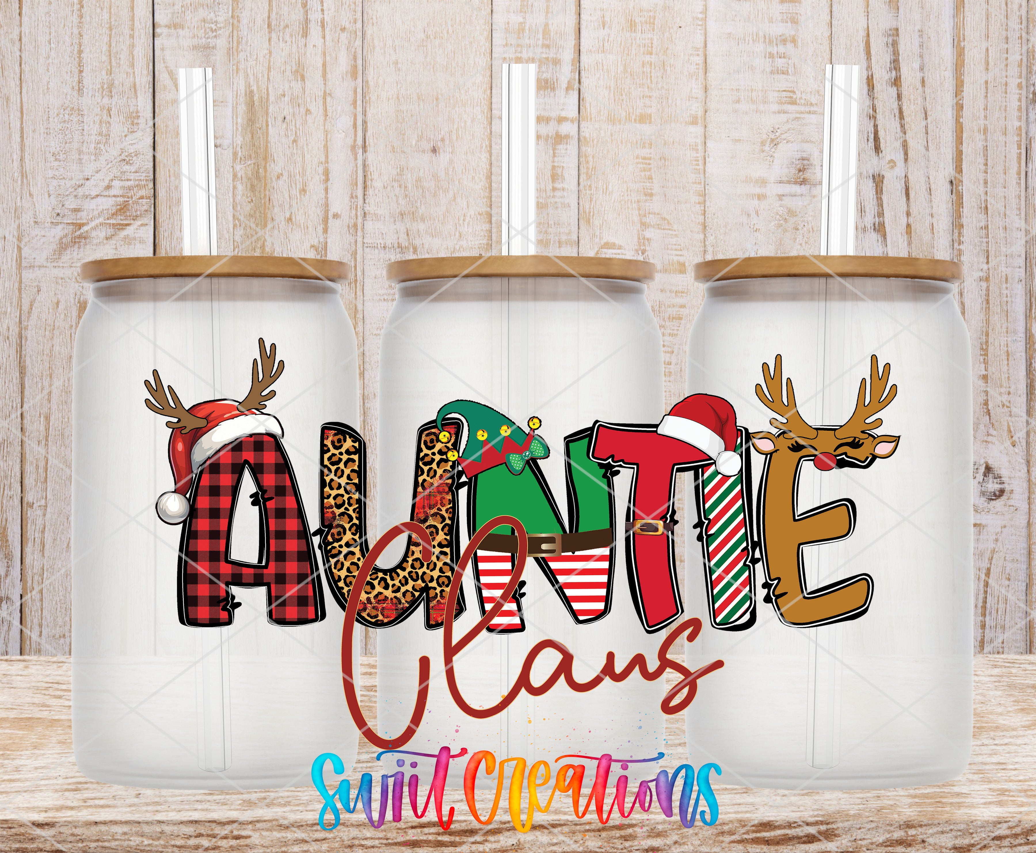 Three glass tumblers with the word "Auntie" written on them, each with a different animal design.