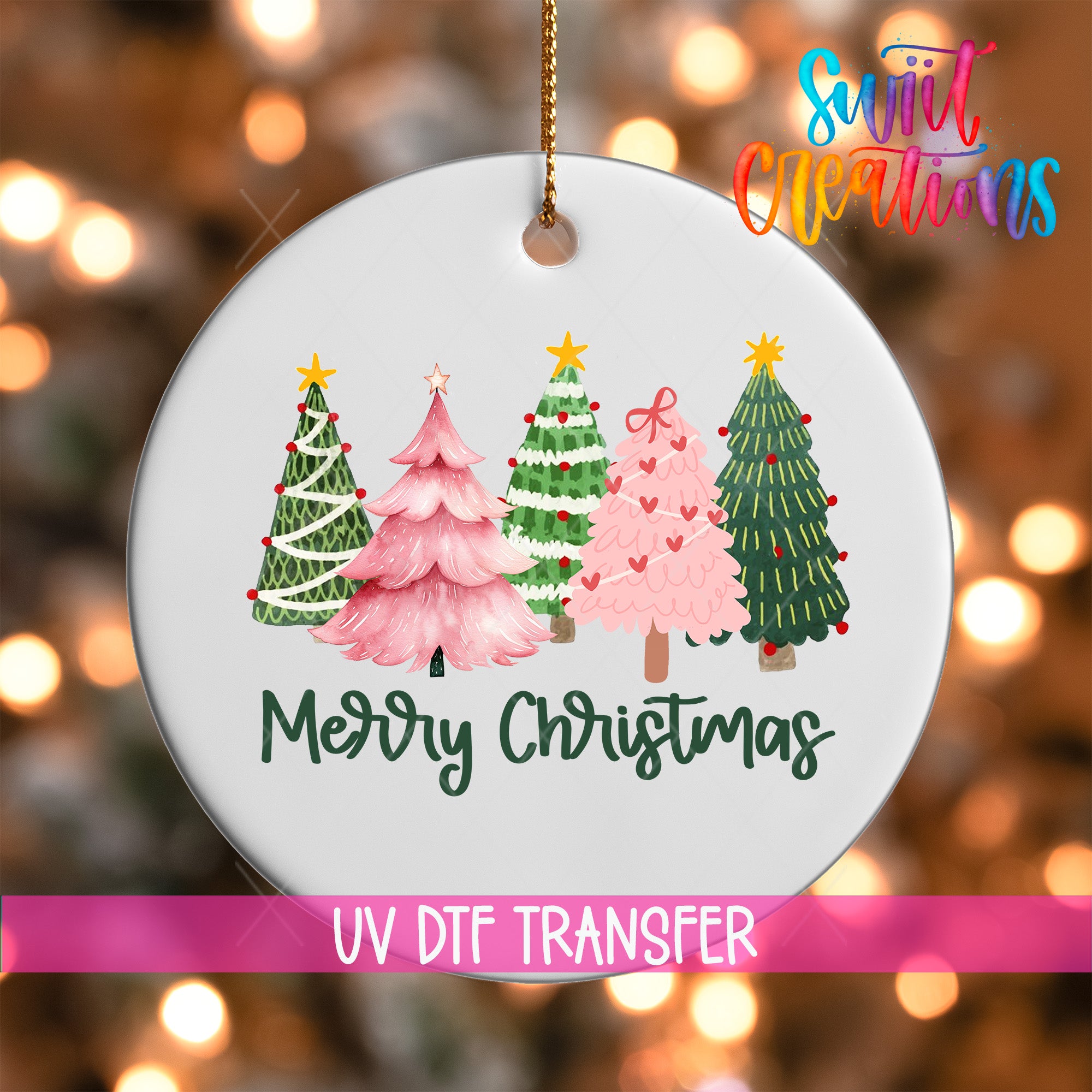 A white ornament with a festive design of four Christmas trees in various colors, including pink, green, and red, along with the text "Merry Christmas" and "UV Dtf Transfer".
