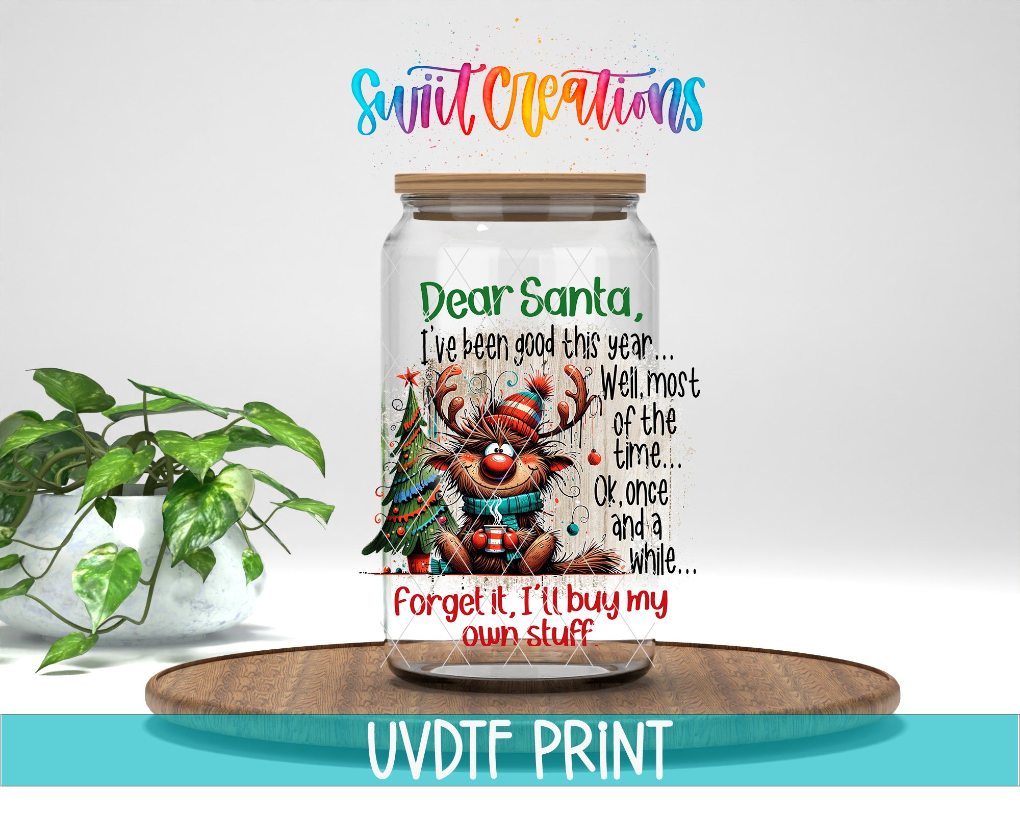 A glass jar with a cartoon reindeer and Christmas decorations, along with a handwritten message that says "Dear Santa, I've been good this year... Well most of the time... OK once and a while... Forget it, I'll buy my own stuff"