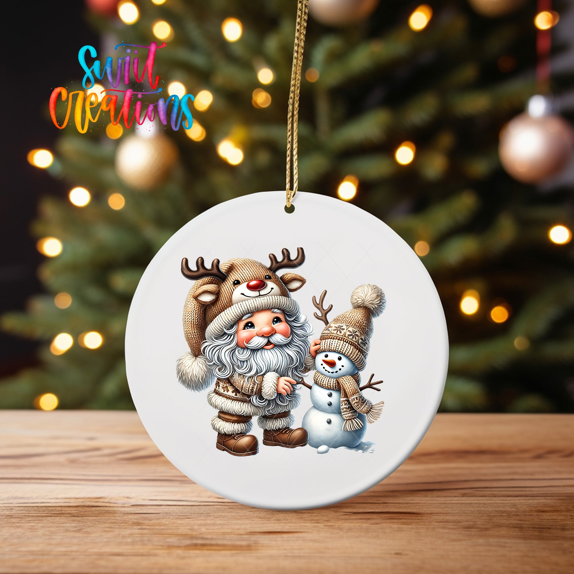 A white ornament featuring Santa Claus and a snowman, with a Christmas tree in the background.