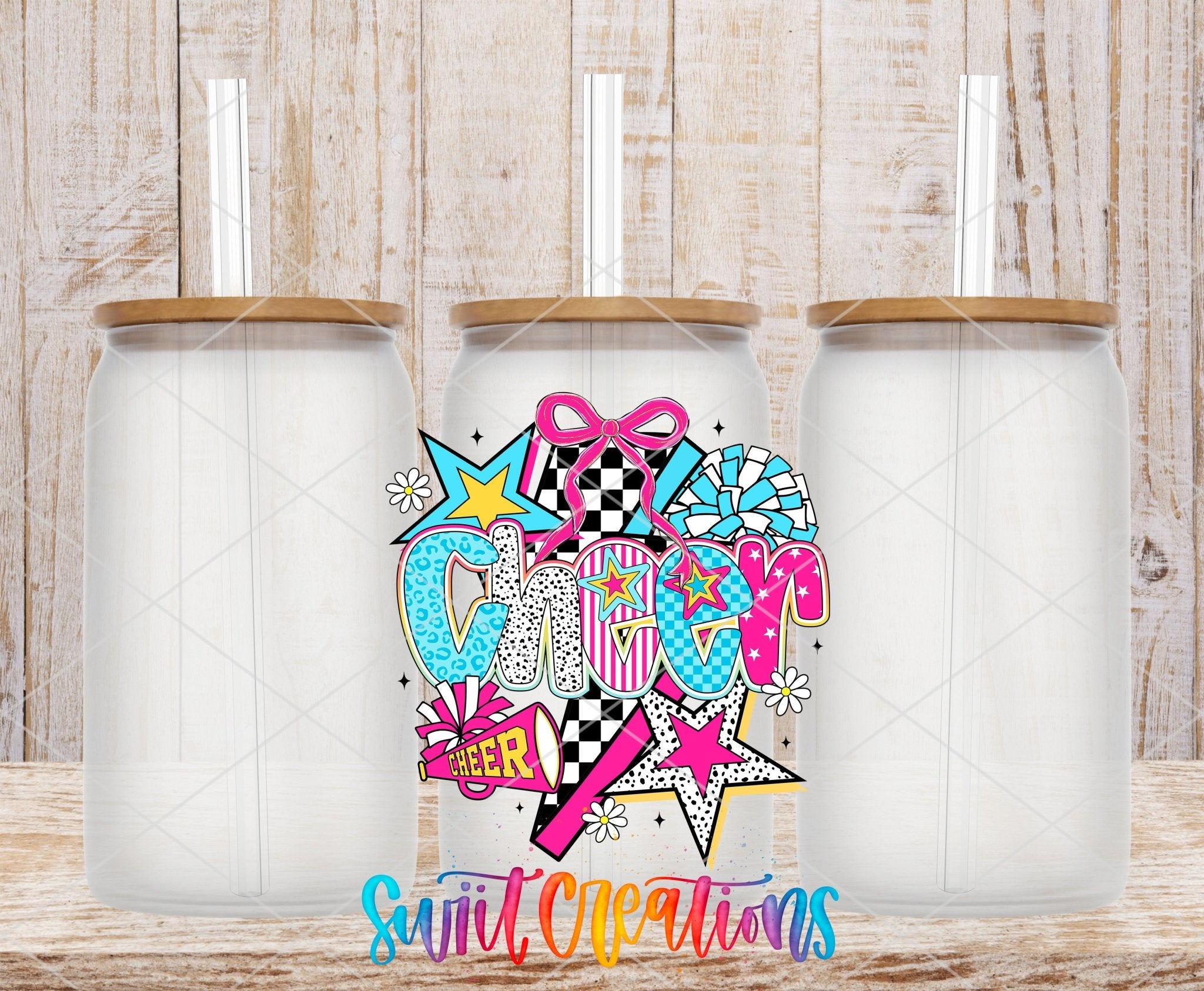 Cheer UV DTF transfer applied to a clear glass can set from Swiit Creations