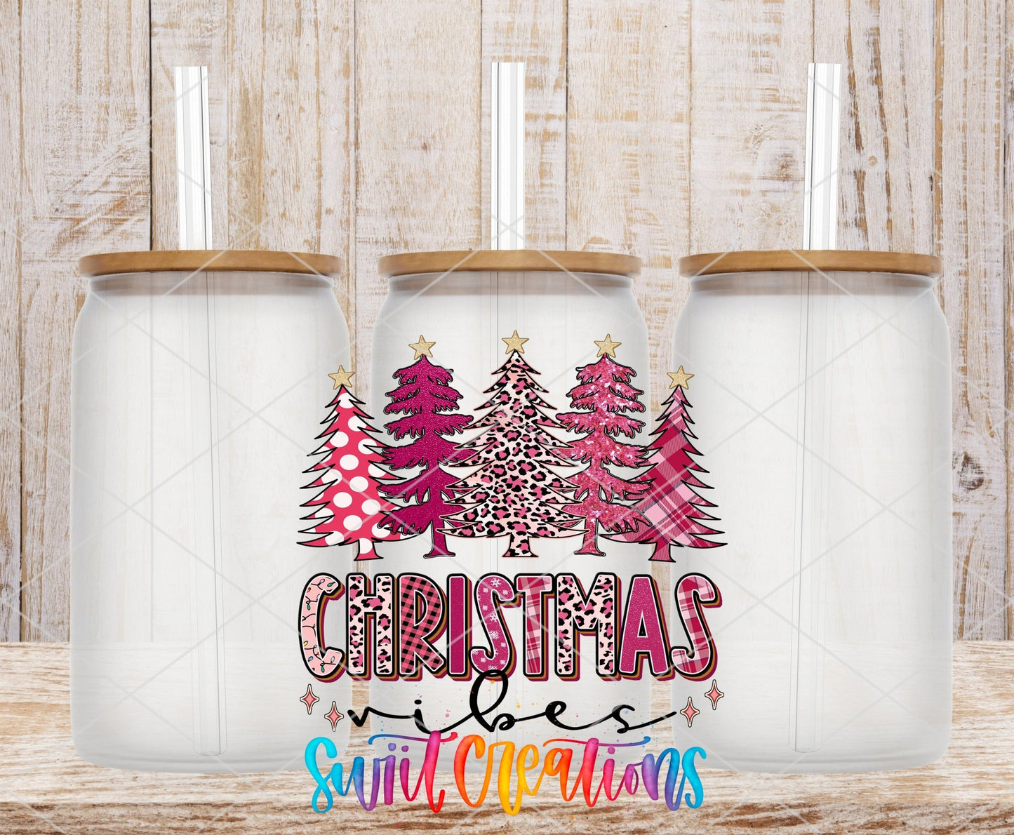 Christmas Vibes UV DTF transfer applied to a clear glass can set from Swiit Creations