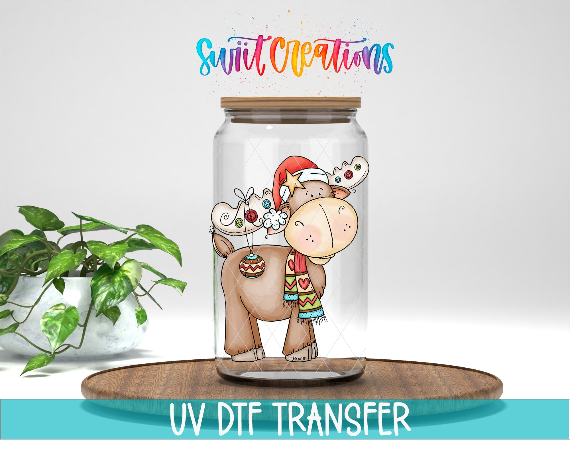 Swiit Creations Cute Christmas Moose UV DTF transfer displayed on a clear glass jar mockup