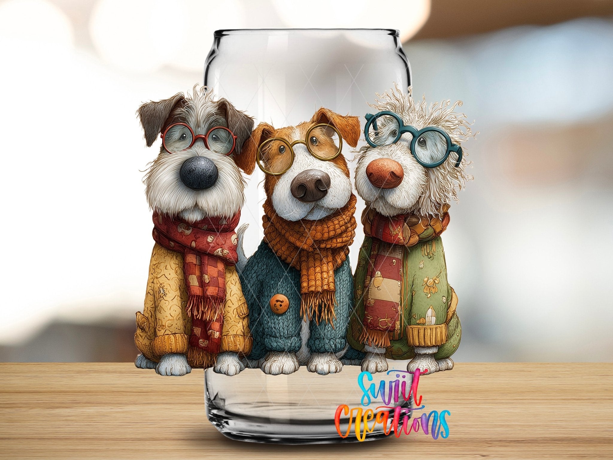 Cute Dogs UV DTF transfer applied to a clear glass can from Swiit Creations