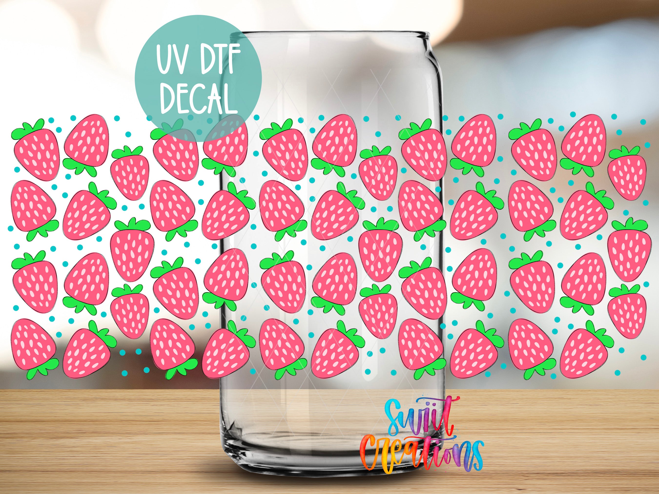 a clear glass jar with a pattern of pink and green strawberries on it, along with some text and logos.