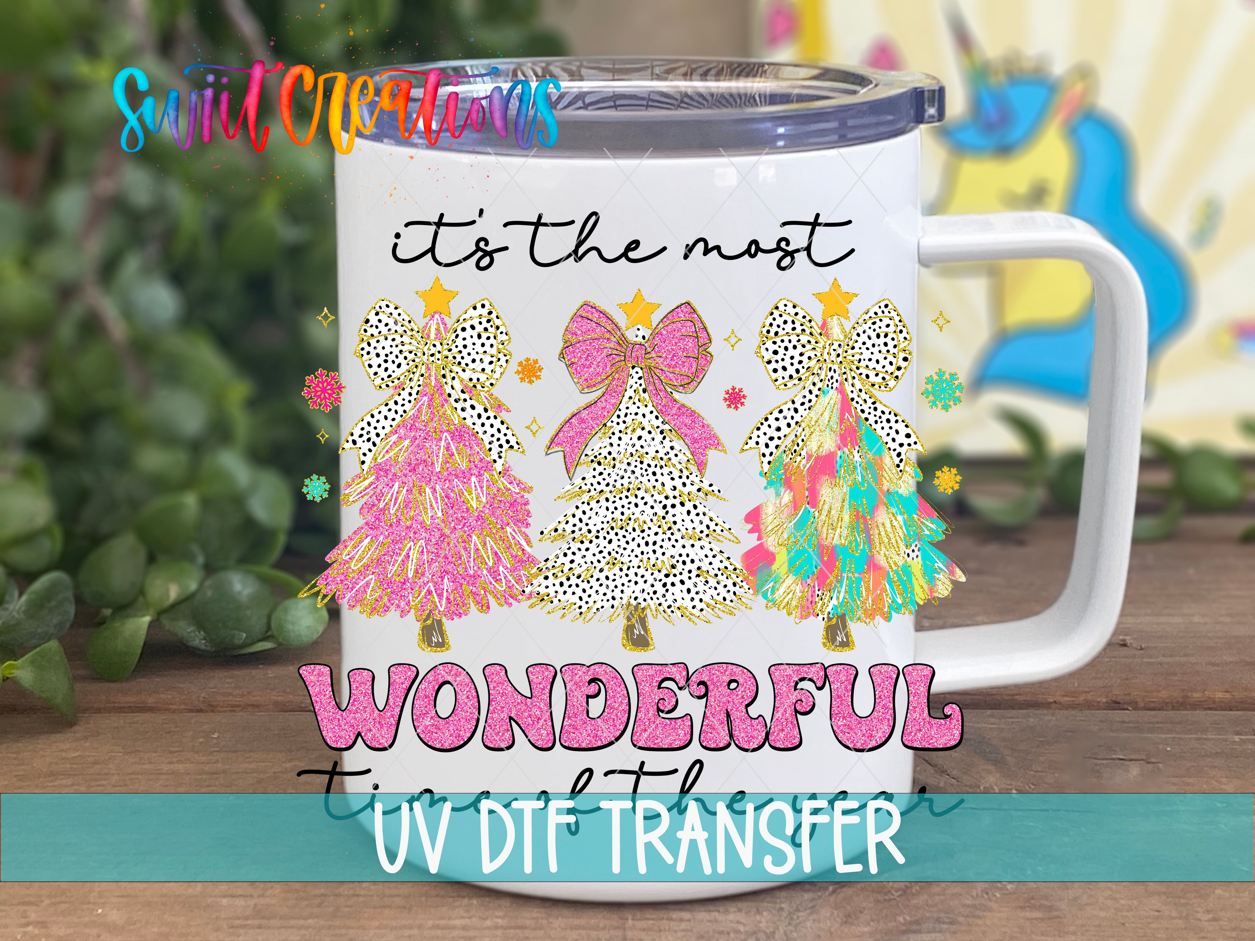 Swiit Creations UV DTF Tis the Season Christmas transfer displayed on a white coffee mug