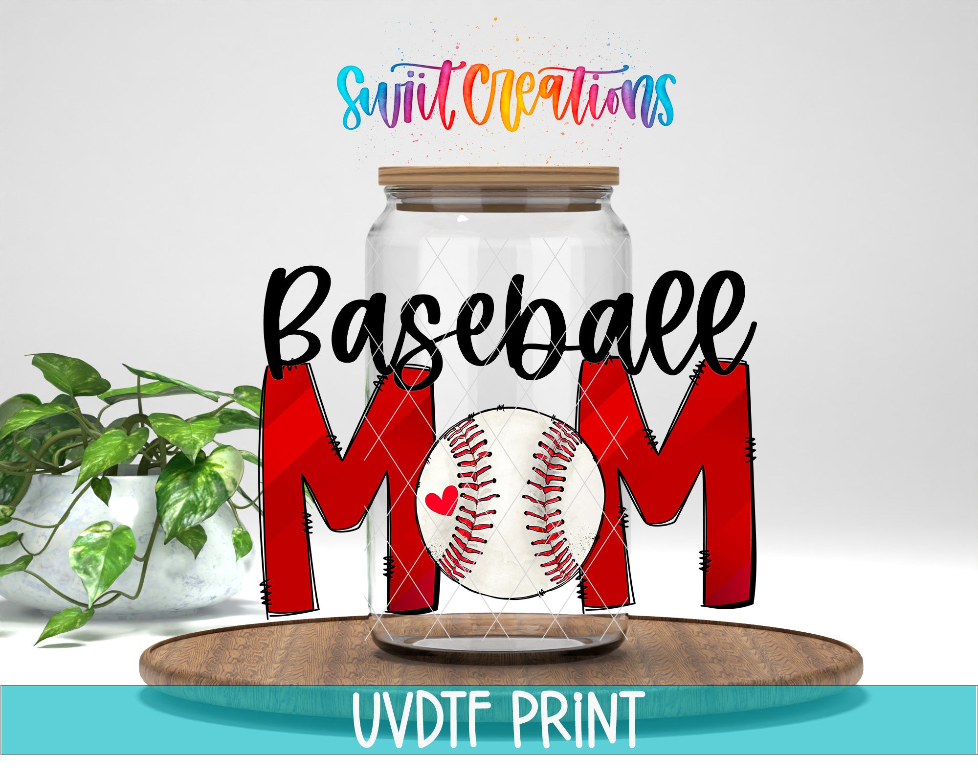 a glass jar with the word "Baseball Mom" written on it, along with a baseball graphic inside the jar. The jar is placed on a wooden surface, and there is a potted plant in the background.