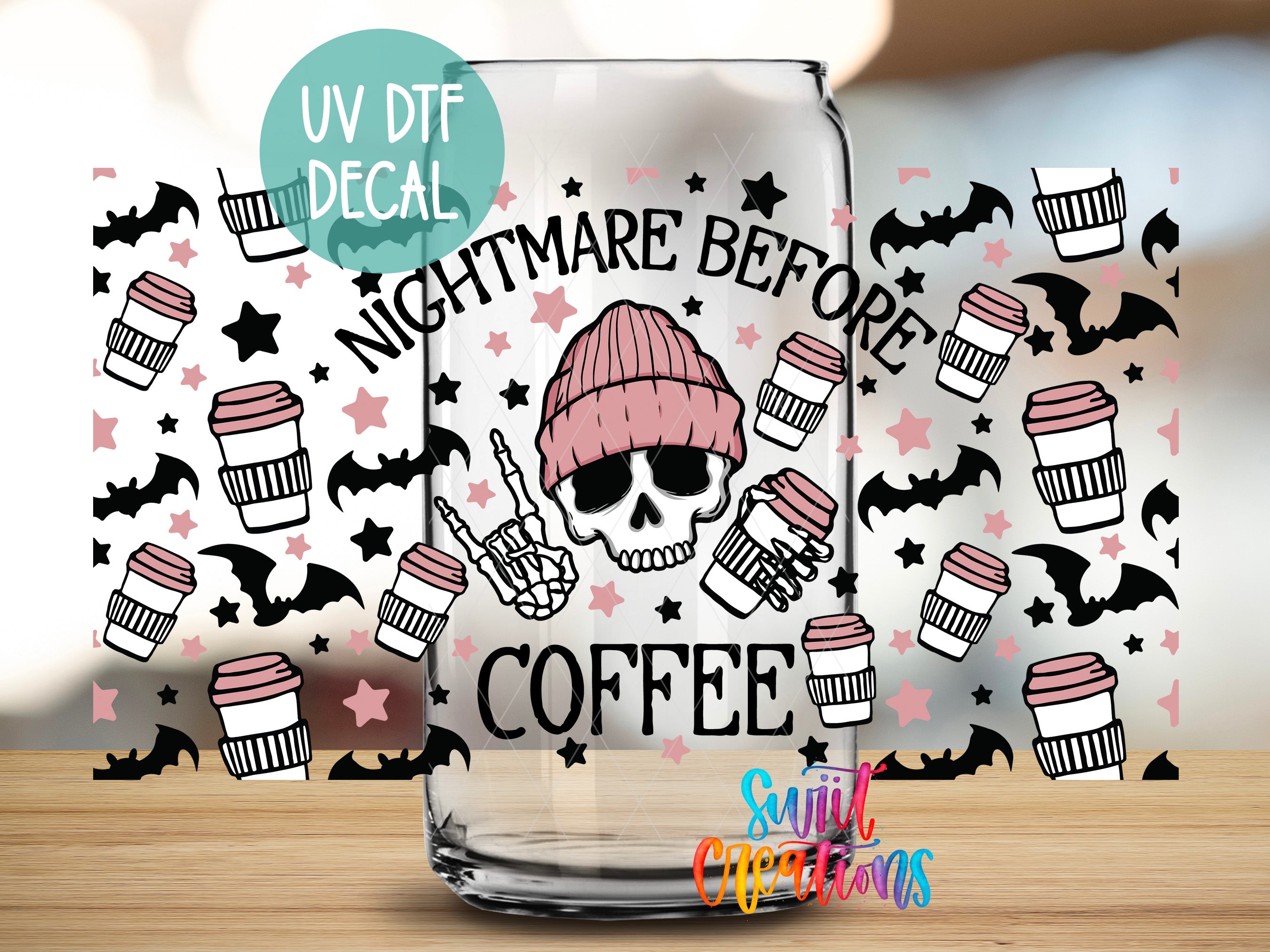 a glass mug with a skull and coffee cup design, along with various coffee cups and bats in a patterned background.