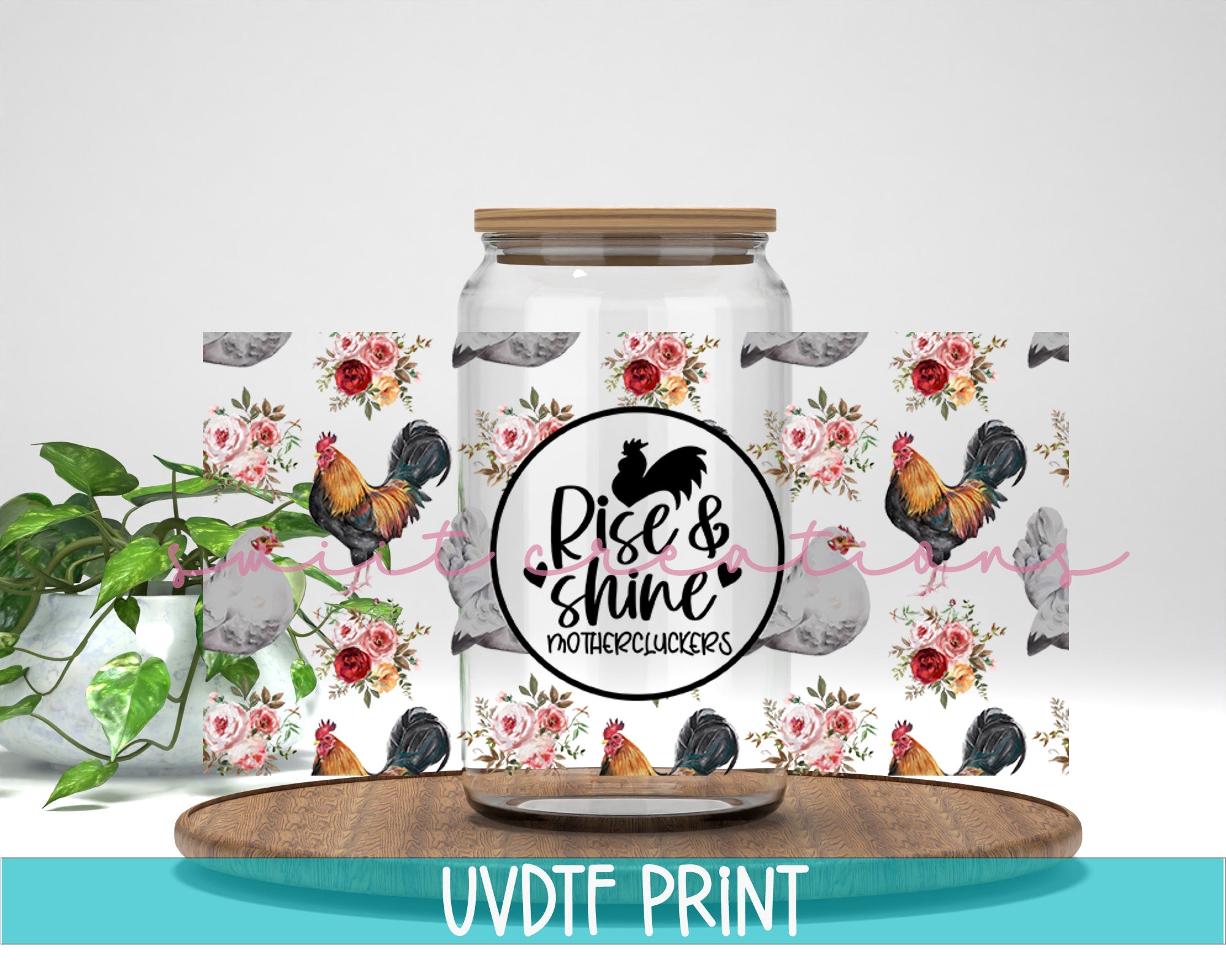 a glass jar with flowers and butterflies on it