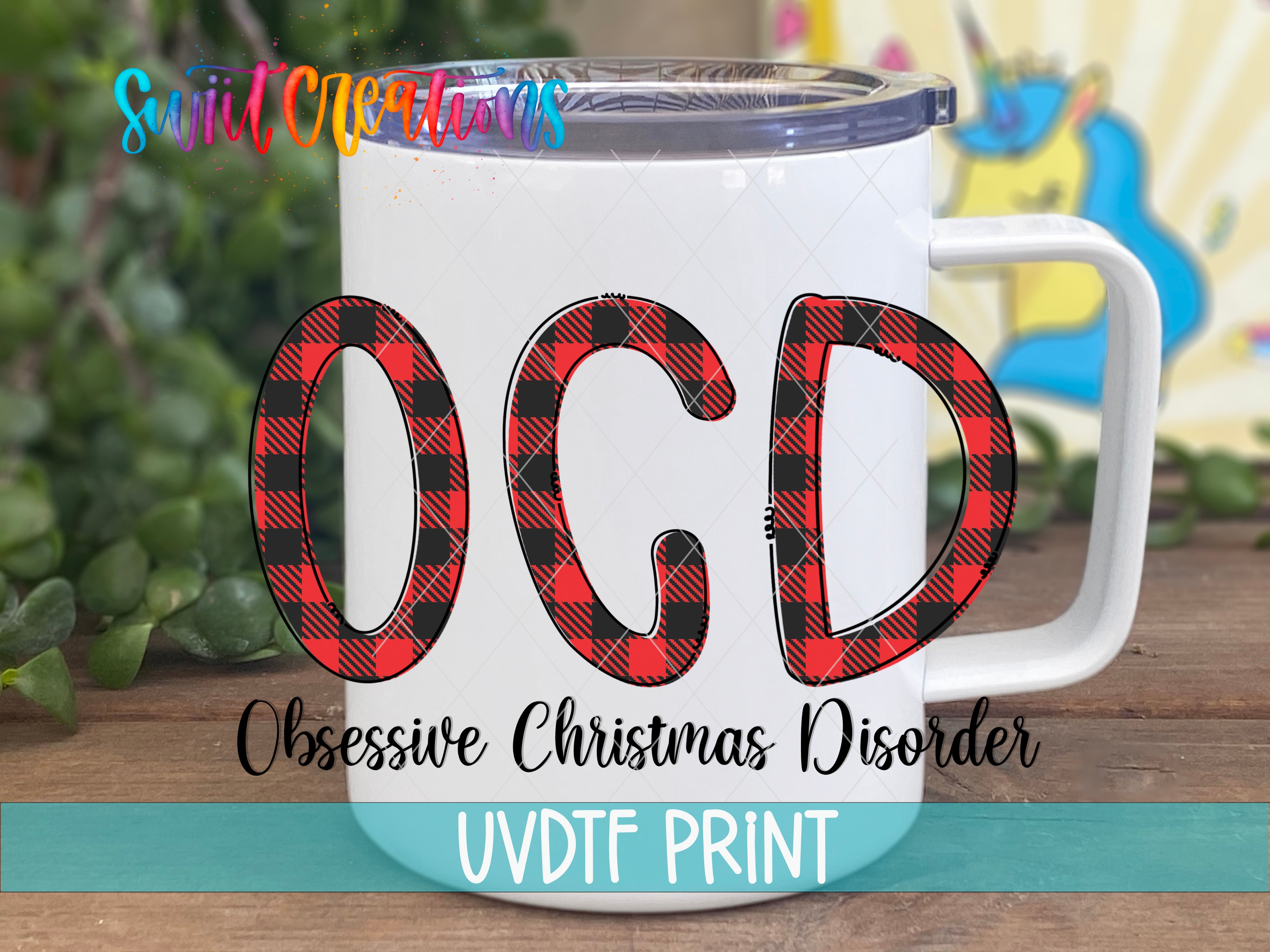 A white mug with a printed design on it, featuring the text "OCD" in a stylized font.