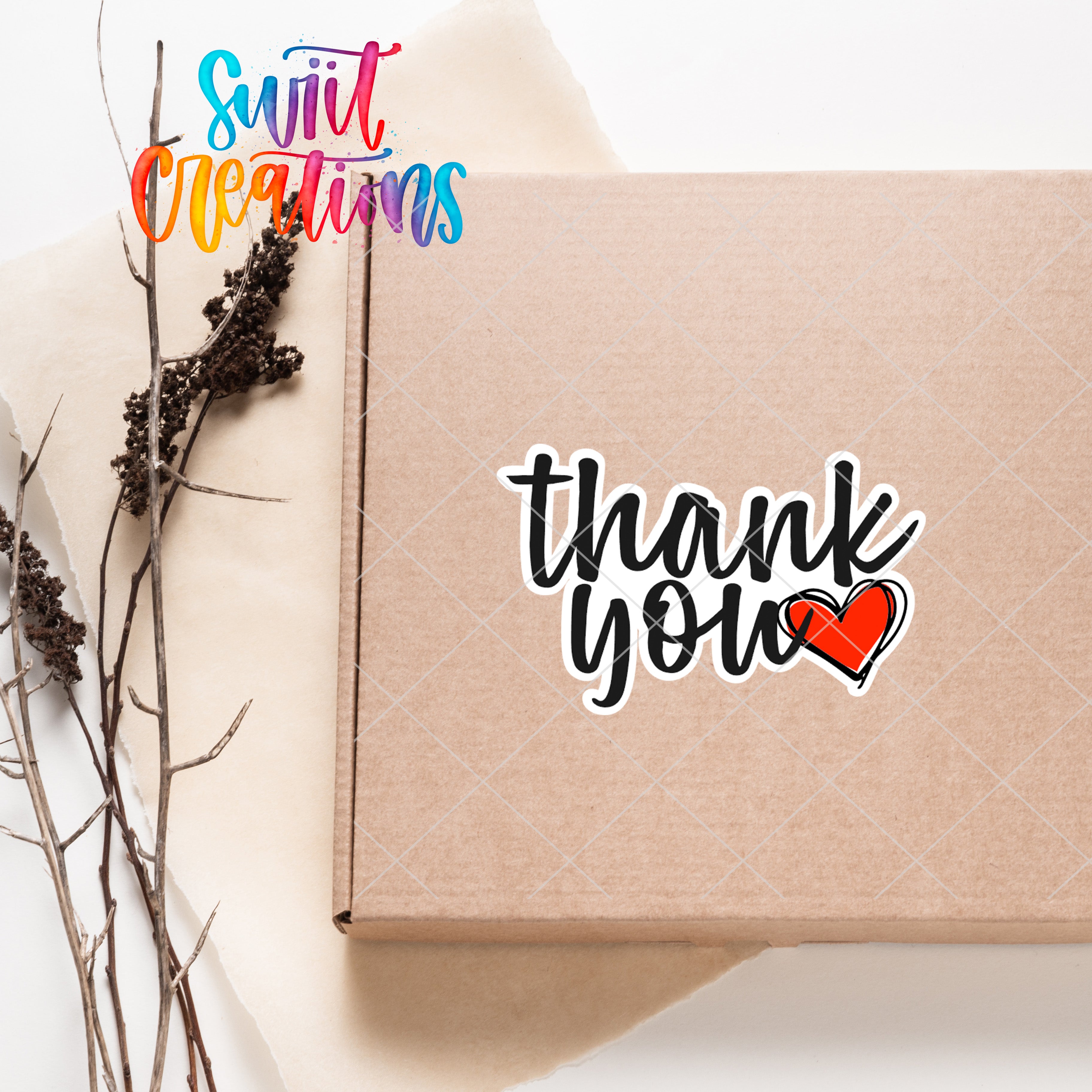 a box with a thank you sticker on it