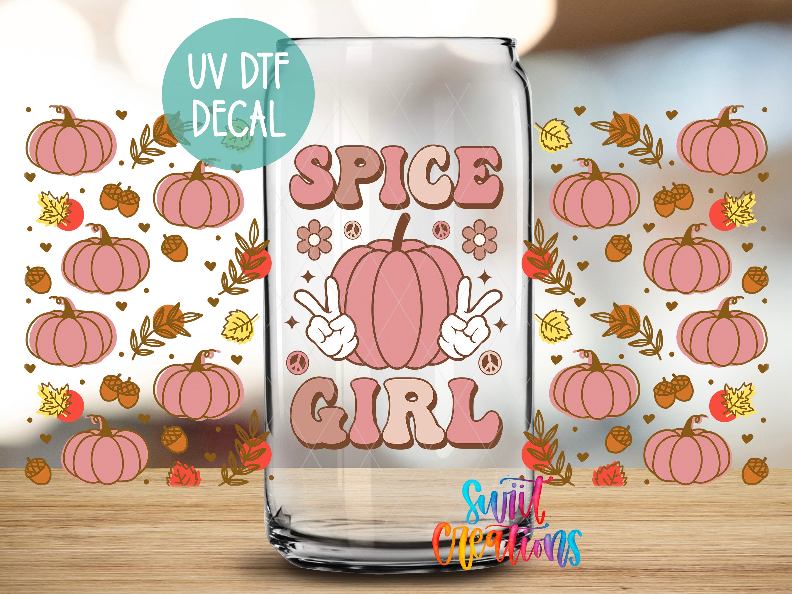 a glass jar with a decorative design on it, surrounded by various autumn-themed elements such as pumpkins, leaves, and peace signs.