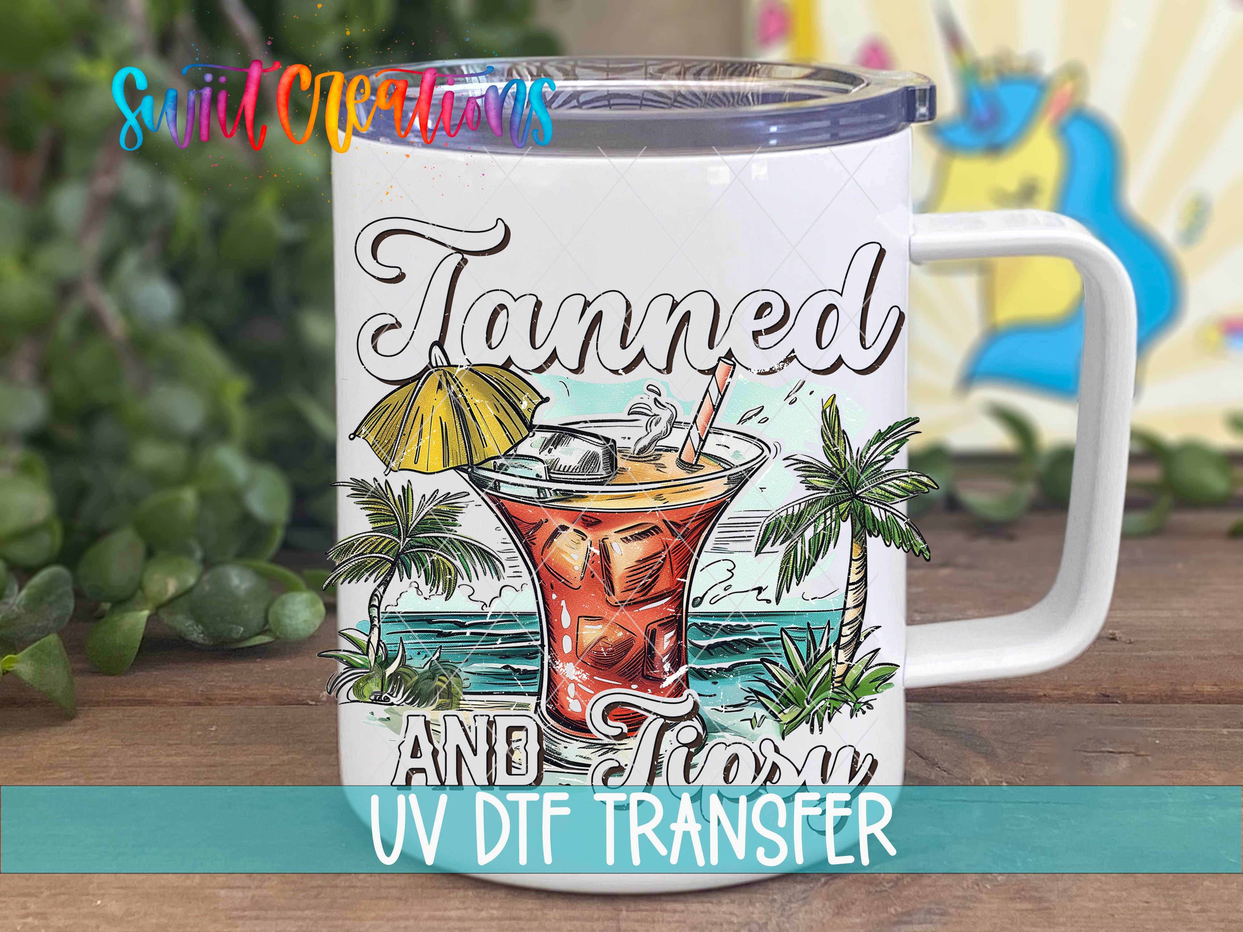 Swiit Creations UV DTF Tanned And Tipsy Tropical Cocktail transfer displayed on a white coffee mug