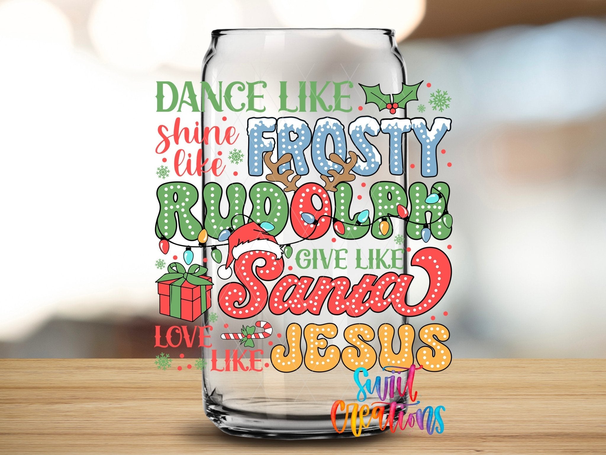 Swiit Creations UV DTF Dance Frosty Shine Rudolph transfer applied to a clear glass can