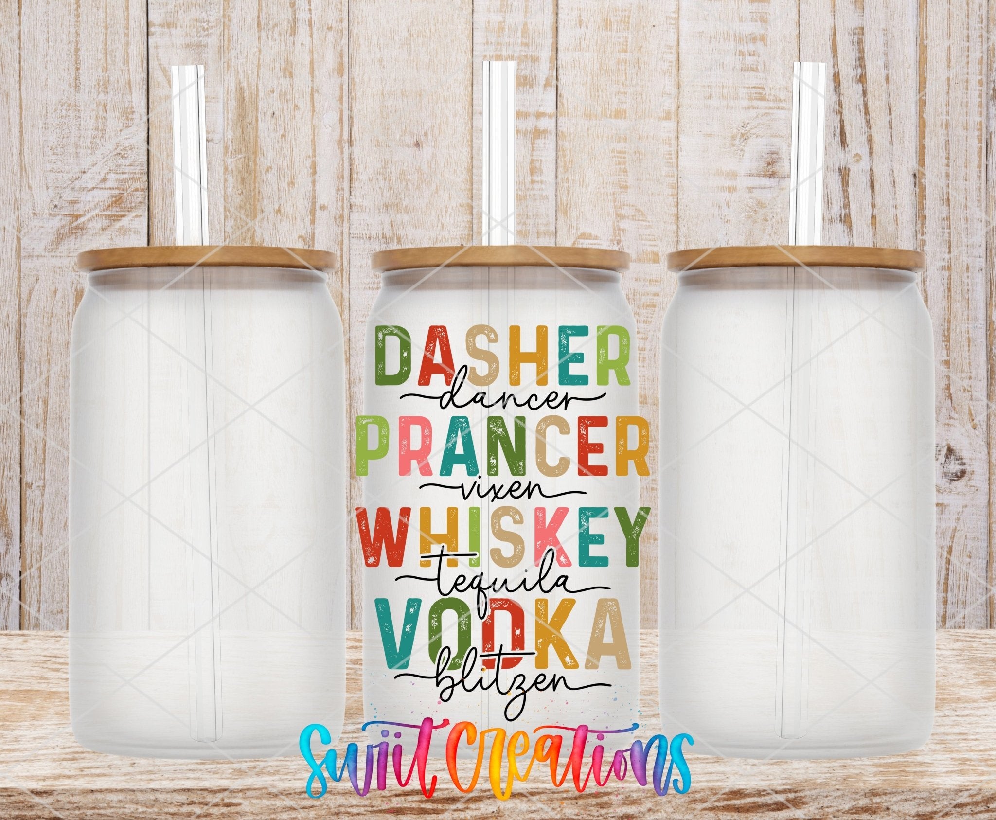 Swiit Creations UV DTF Reindeer Names and Holiday Spirits transfer shown on a clear glass can set