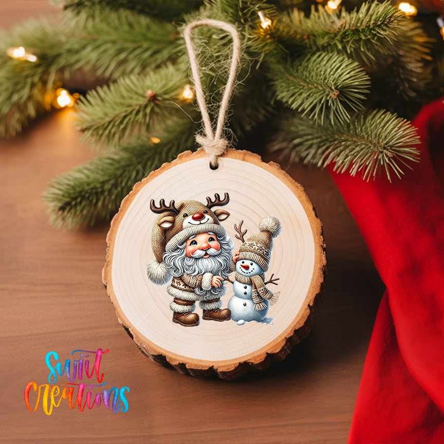 A wooden ornament featuring Santa Claus, a reindeer, and a snowman, hanging on a Christmas tree.